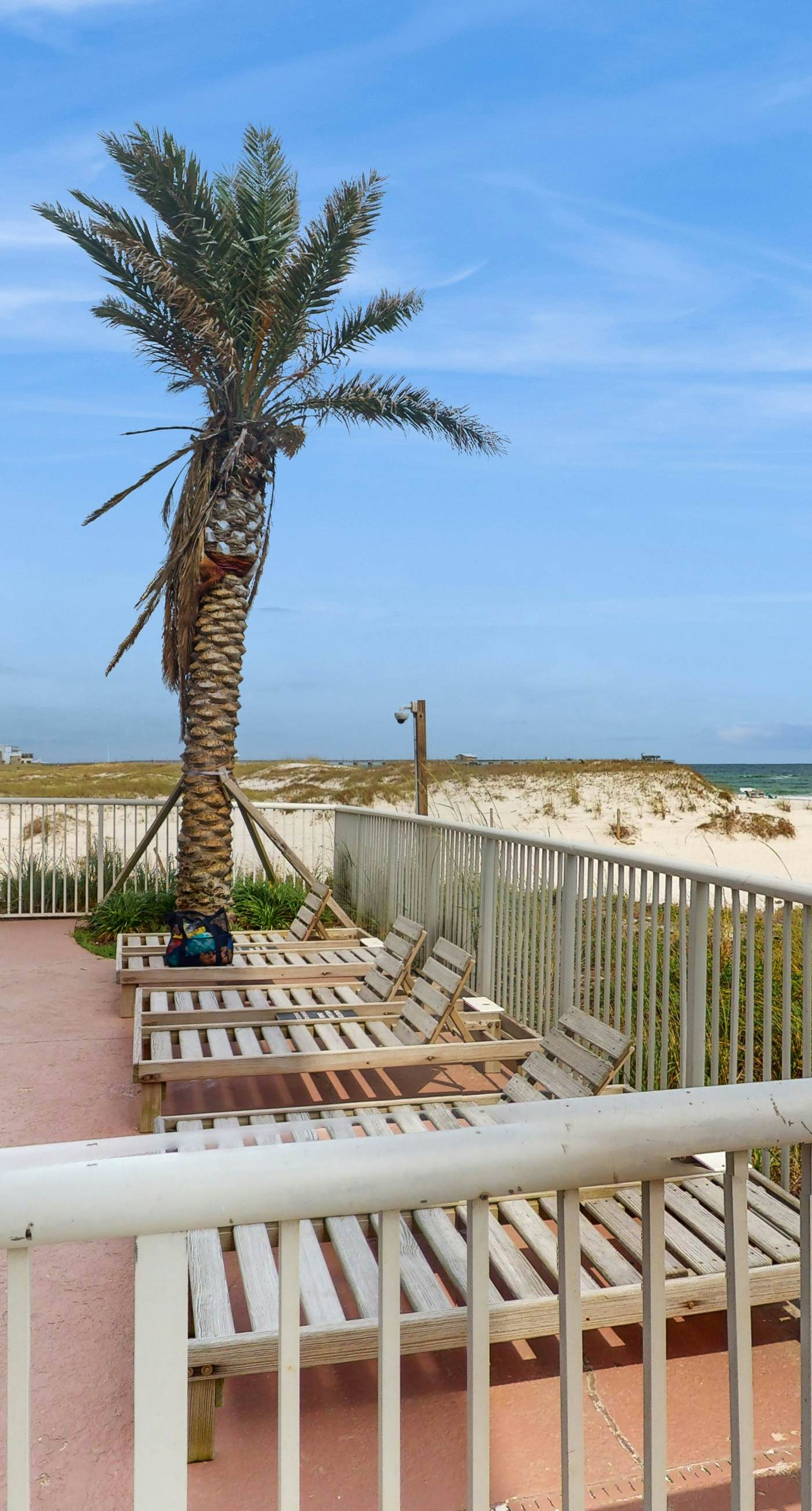 Beach-front condo with pool, hot tub, sauna, washer,dryer & grill