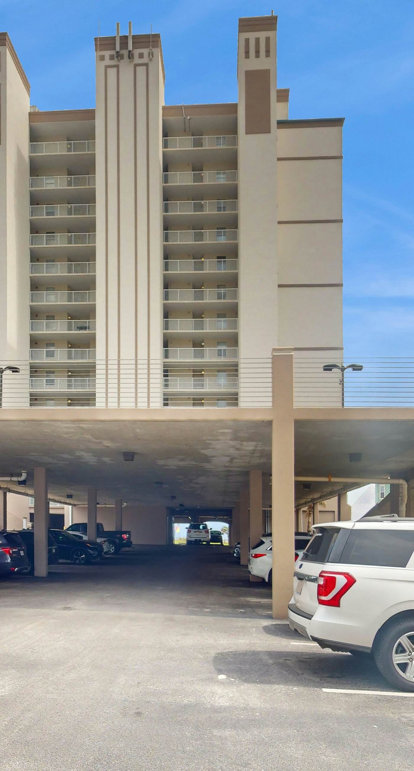 Beach-front condo with pool, hot tub, sauna, washer,dryer & grill