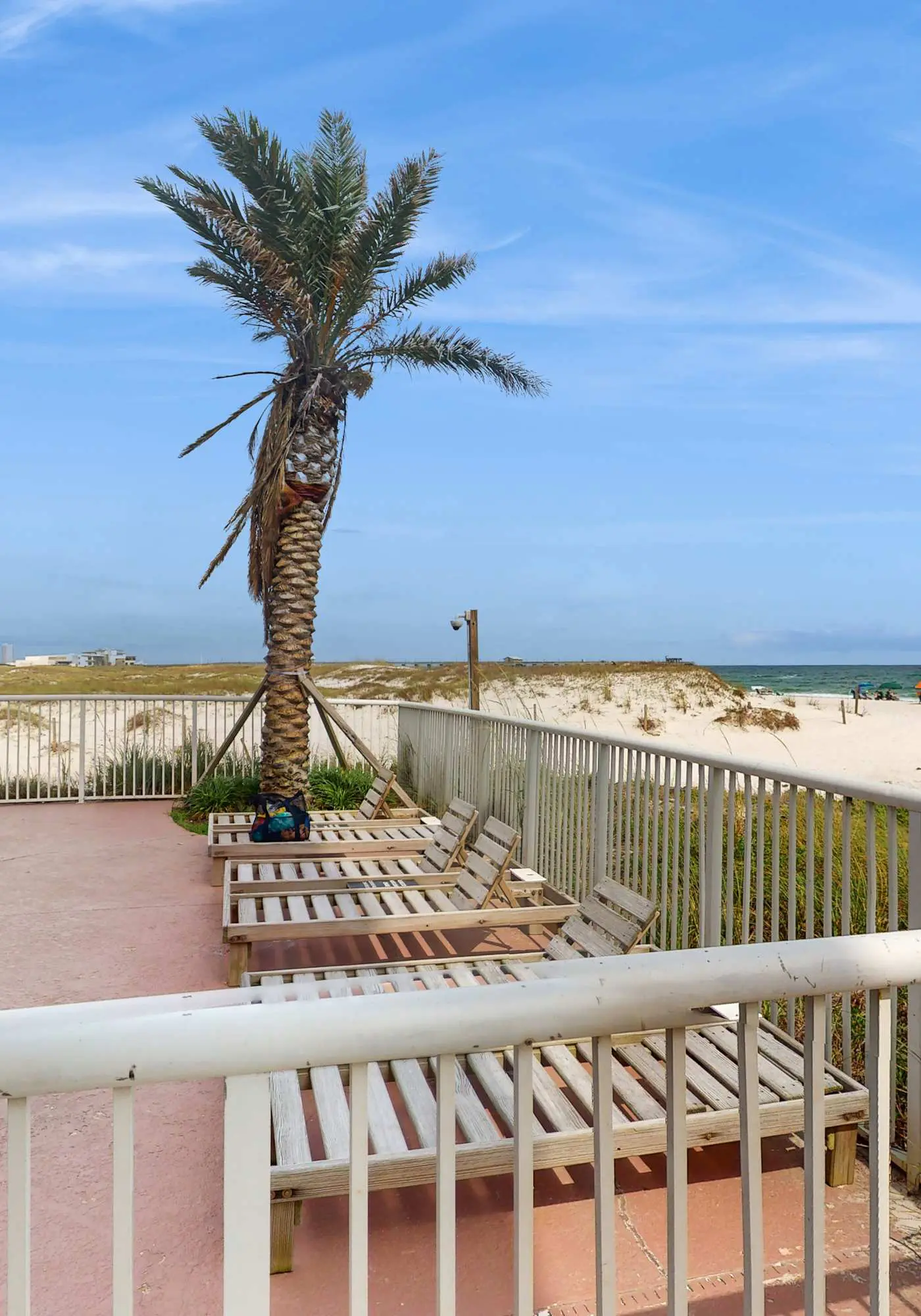 Beach-front condo with pool, hot tub, sauna, washer,dryer & grill