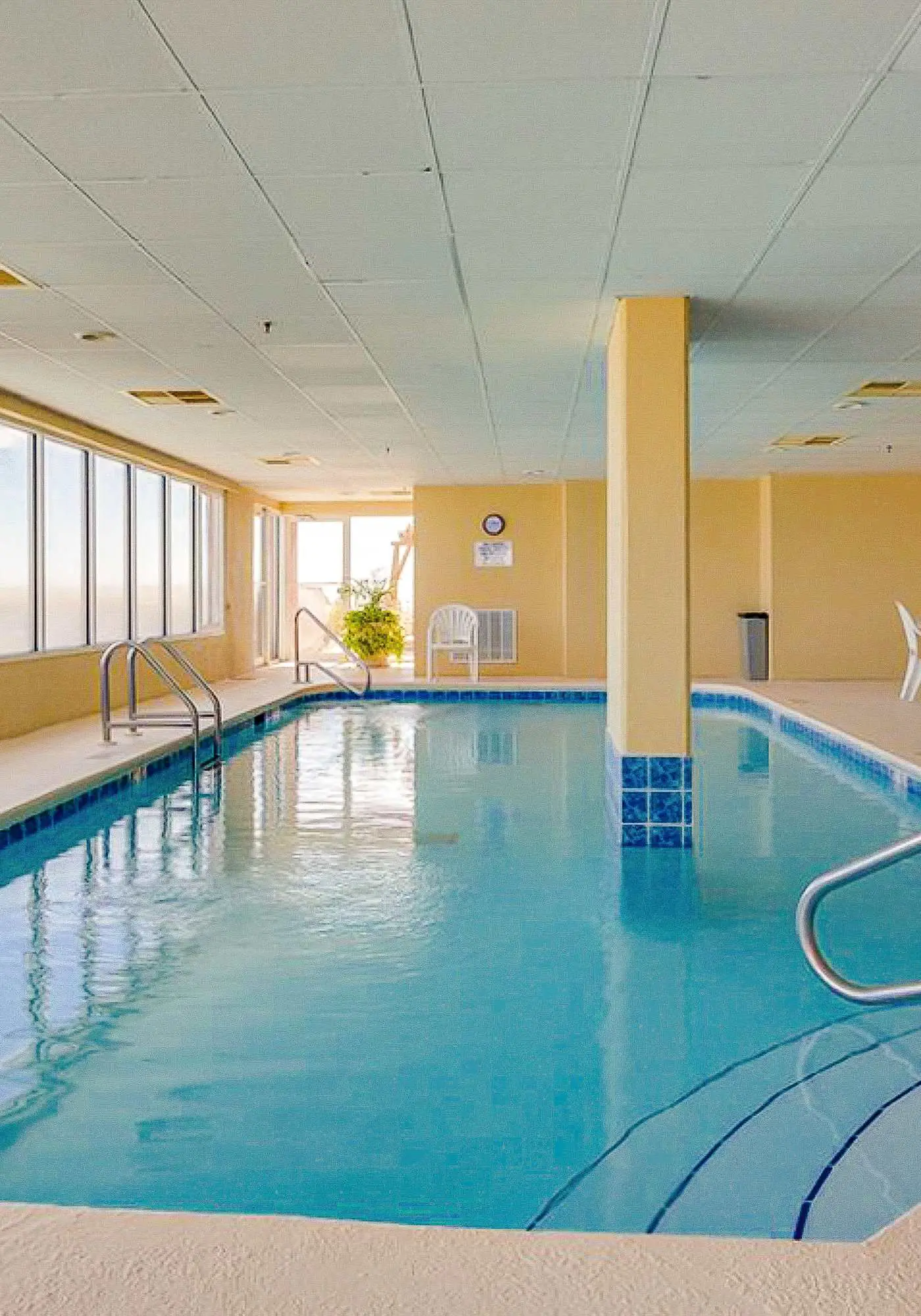 Beach-front condo with pool, hot tub, sauna, washer,dryer & grill