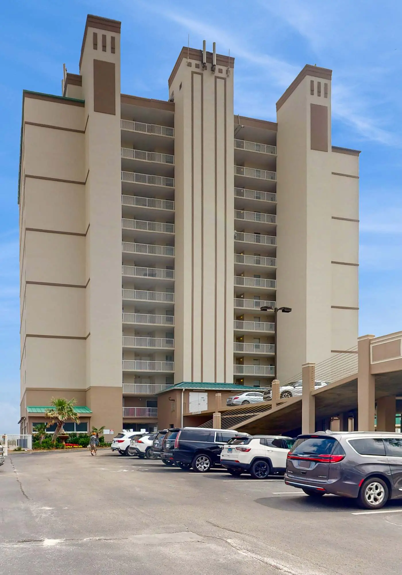 Beach-front condo with pool, hot tub, sauna, washer,dryer & grill