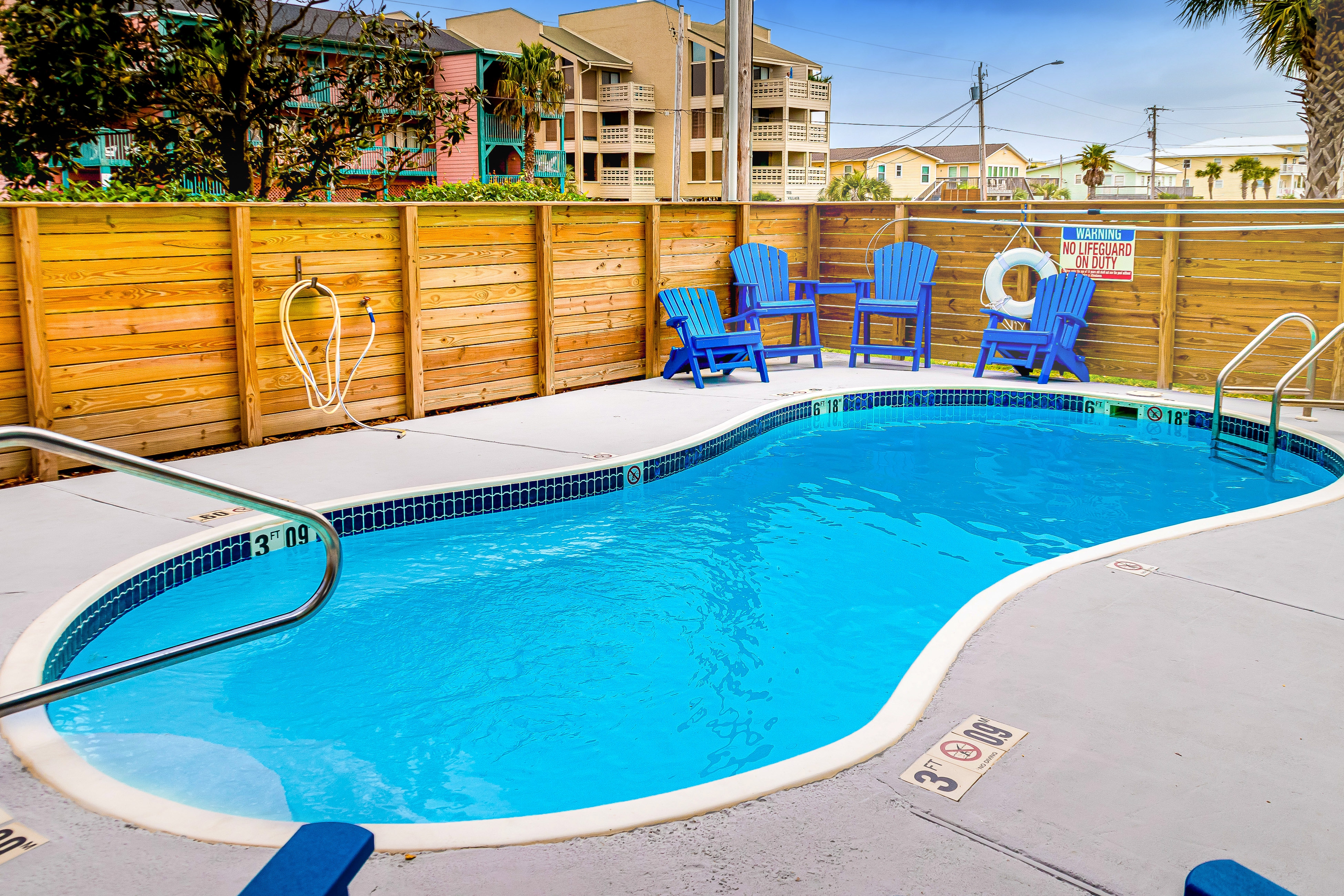 Beachfront condo with shared pool, outdoor shower, and beach access