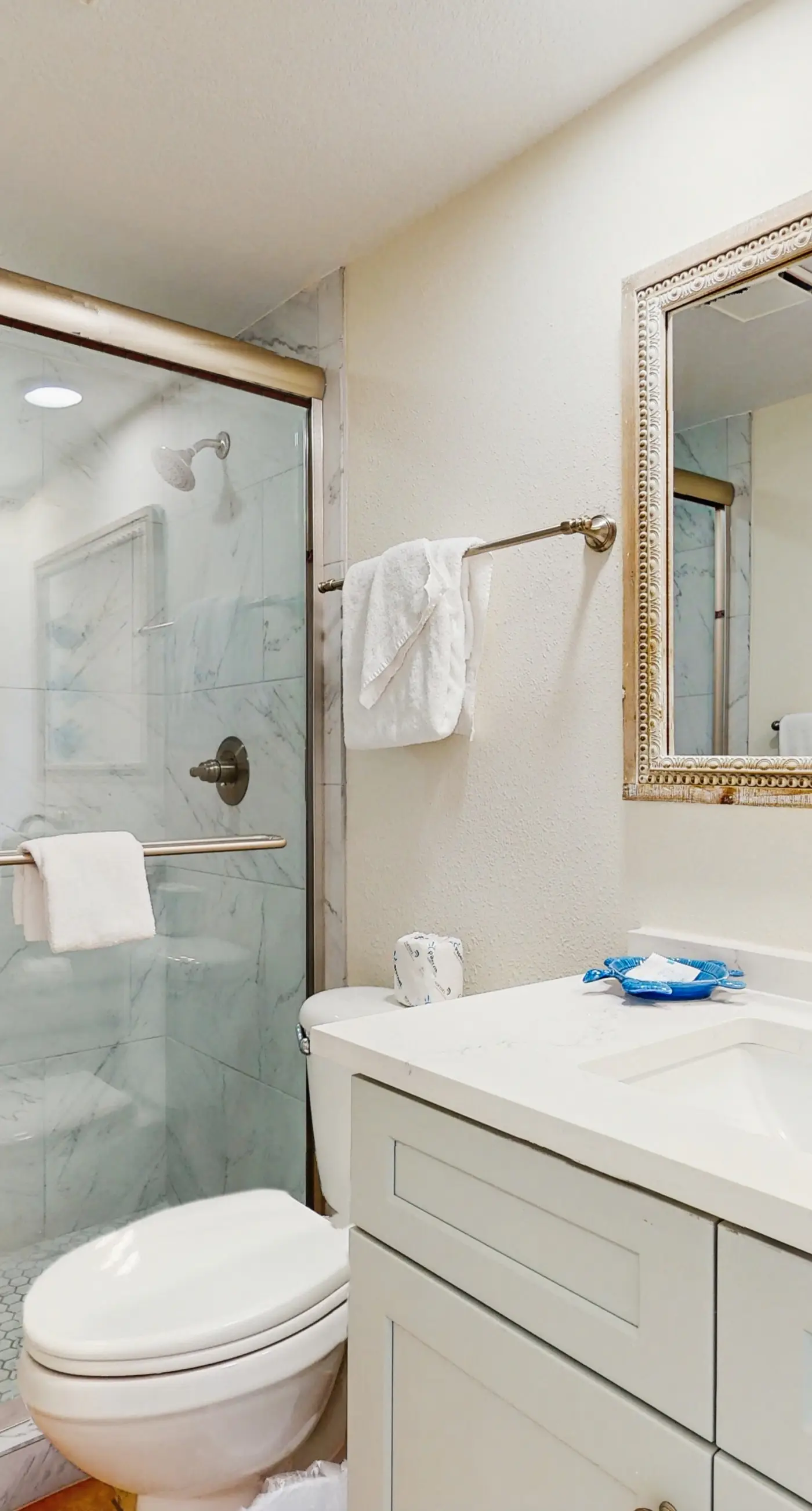Stunning Gulf front condo w/ a spacious layout, shared pools, & fitness room