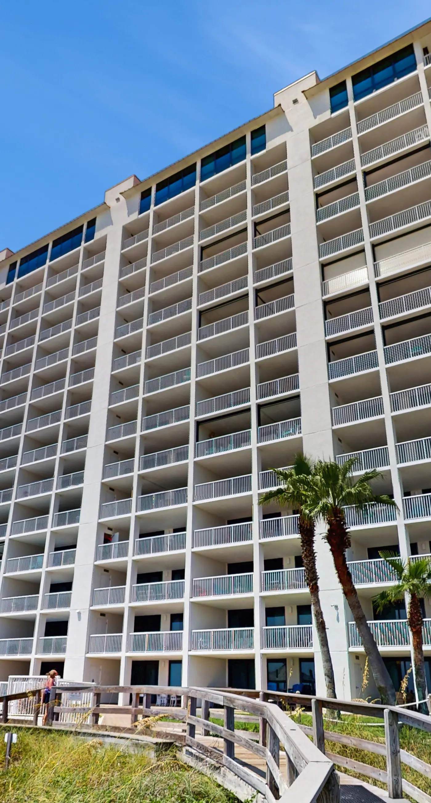 Stunning Gulf front condo w/ a spacious layout, shared pools, & fitness room