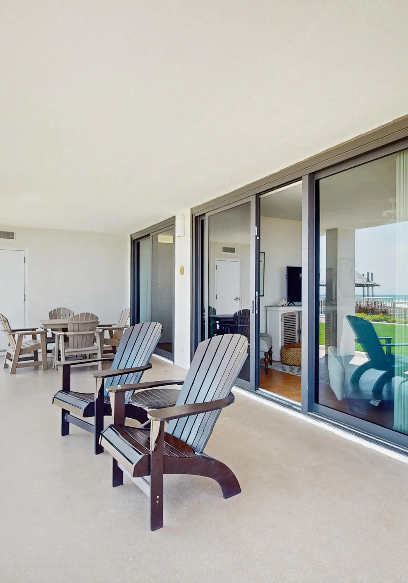 Stunning Gulf front condo with a spacious layout, shared pools, & fitness room