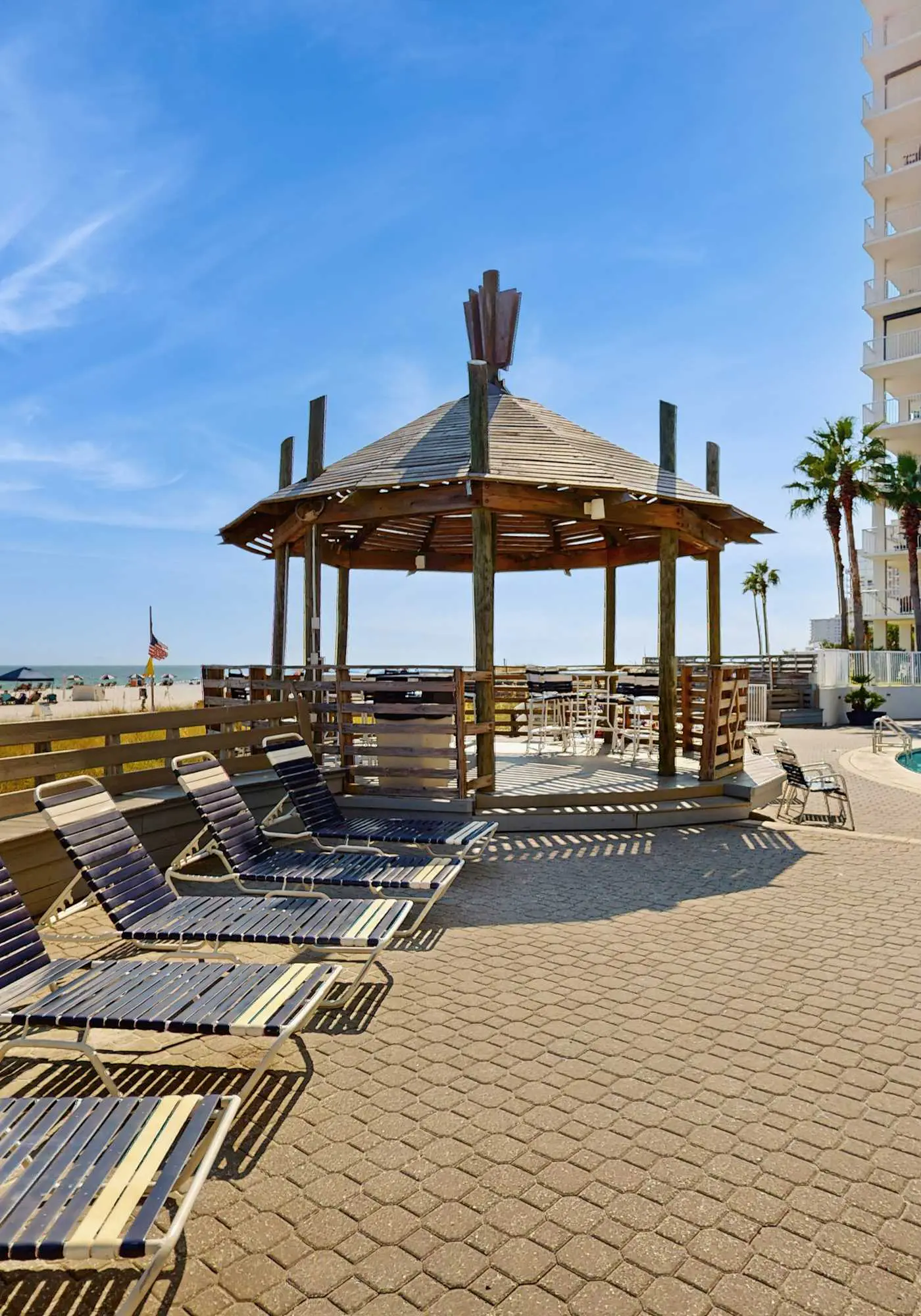 Stunning Gulf front condo with a spacious layout, shared pools, & fitness room