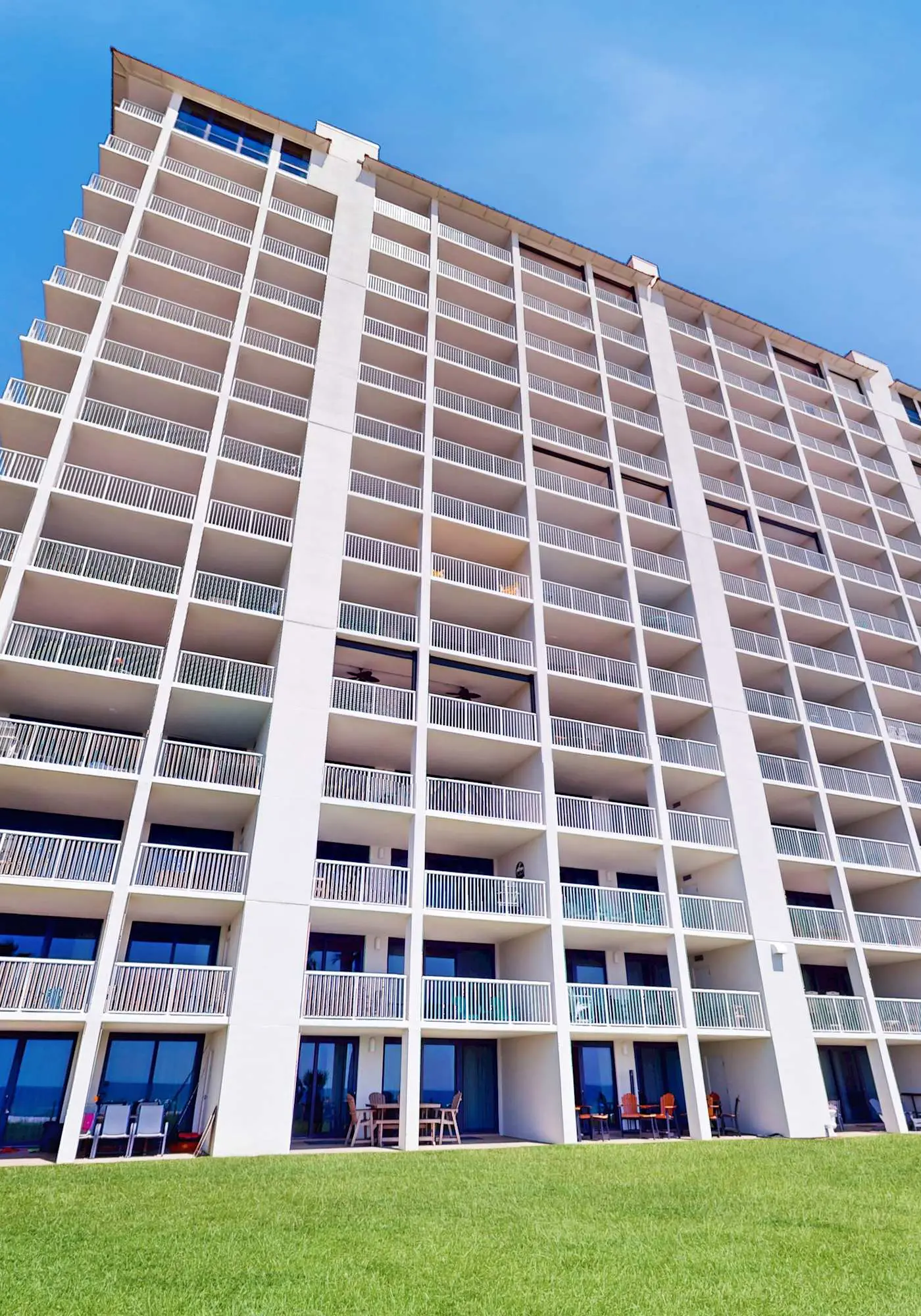 Stunning Gulf front condo with a spacious layout, shared pools, & fitness room