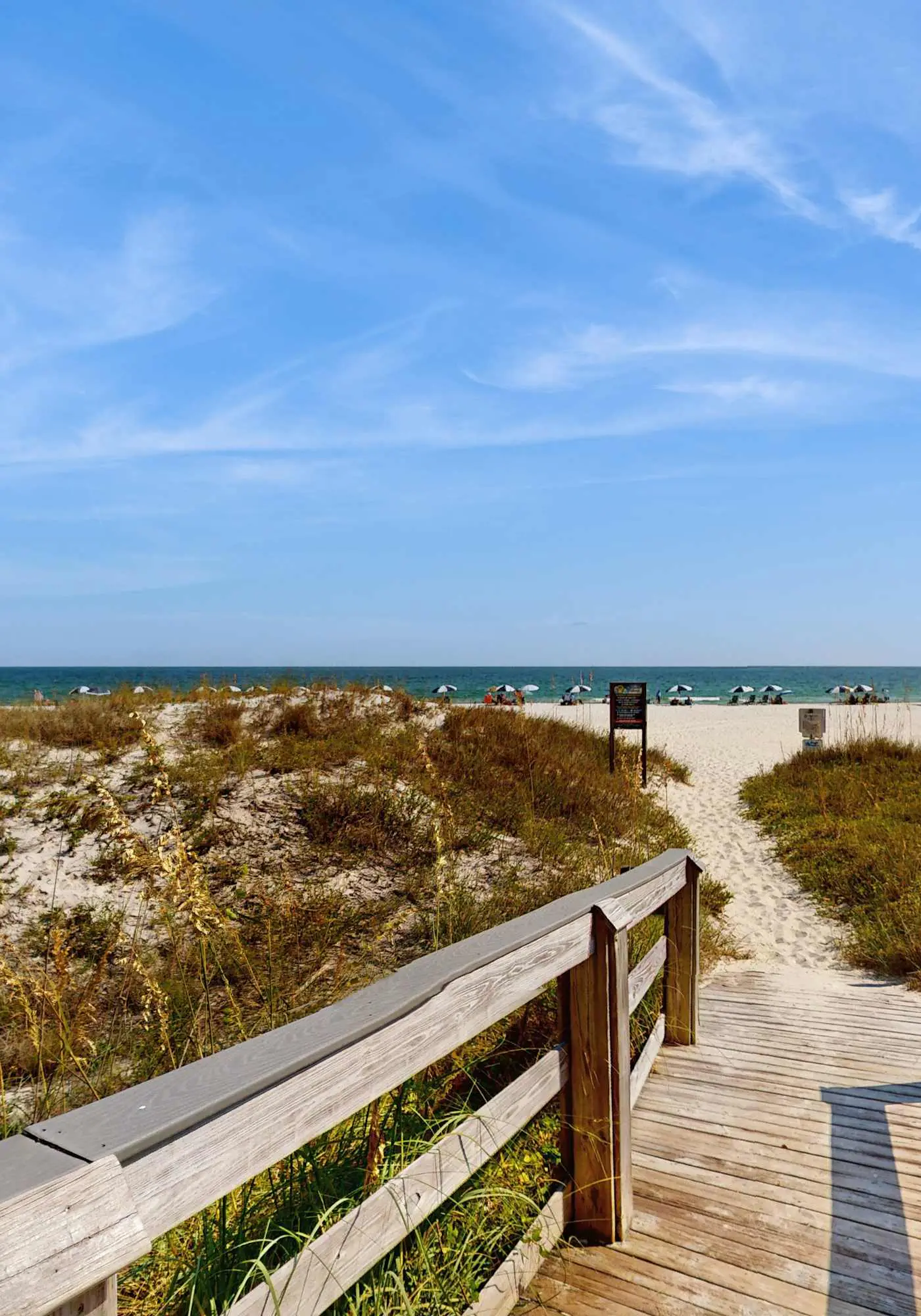 Elegant beachfront condo with wraparound balcony, Gulf views & pools