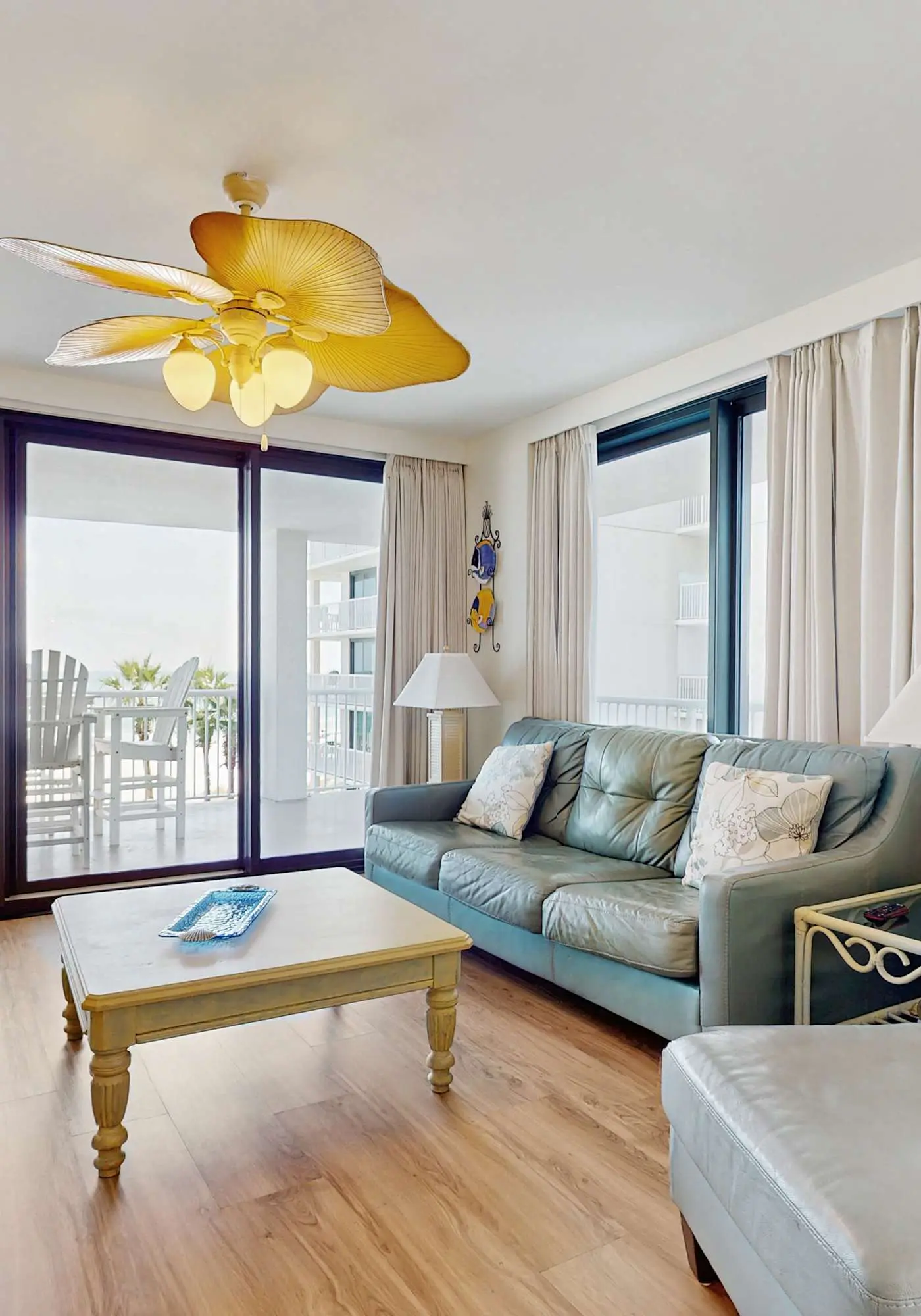 Elegant beachfront condo with wraparound balcony, Gulf views & pools