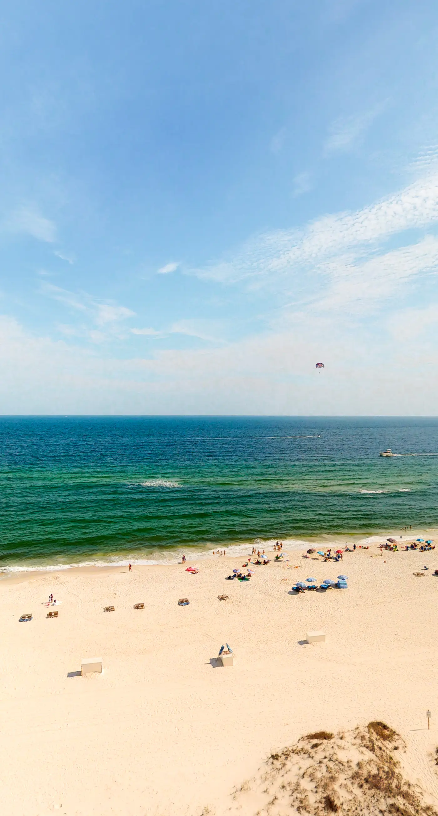 High-rise, Gulf-front condo with a balcony, pools, gym & tennis