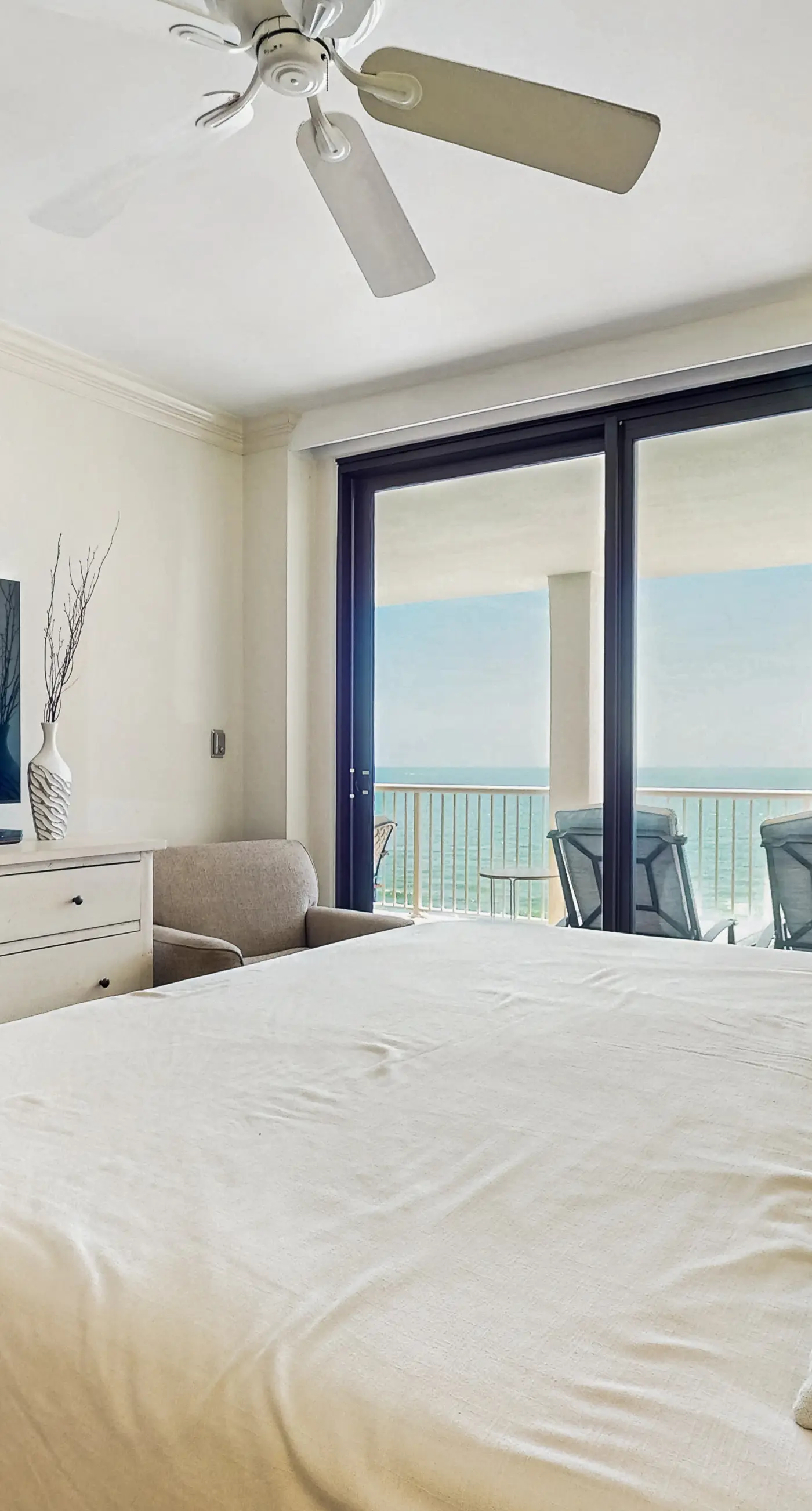 High-rise, Gulf-front condo with a balcony, pools, gym & tennis