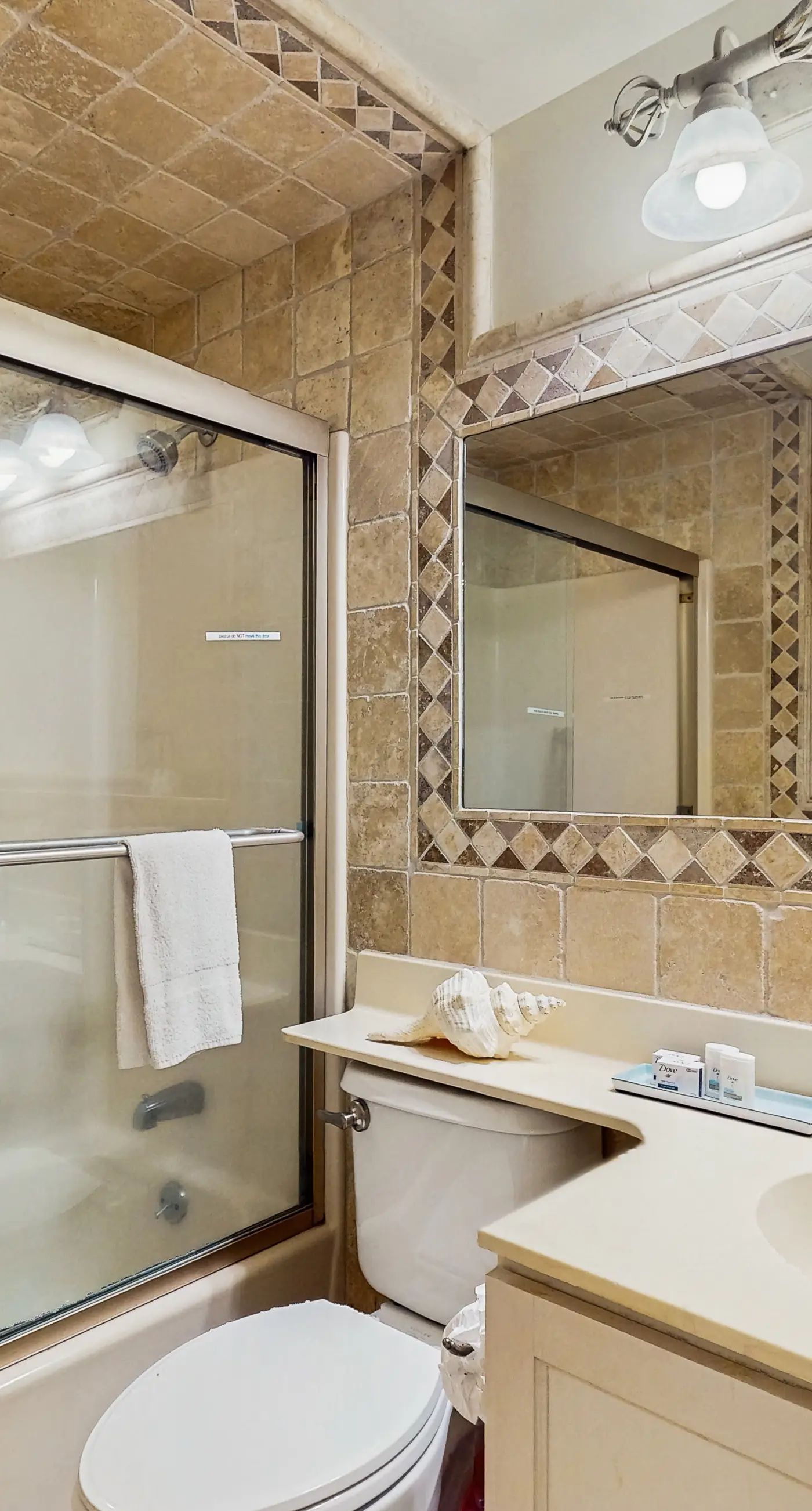 High-rise, Gulf-front condo with a balcony, pools, gym & tennis