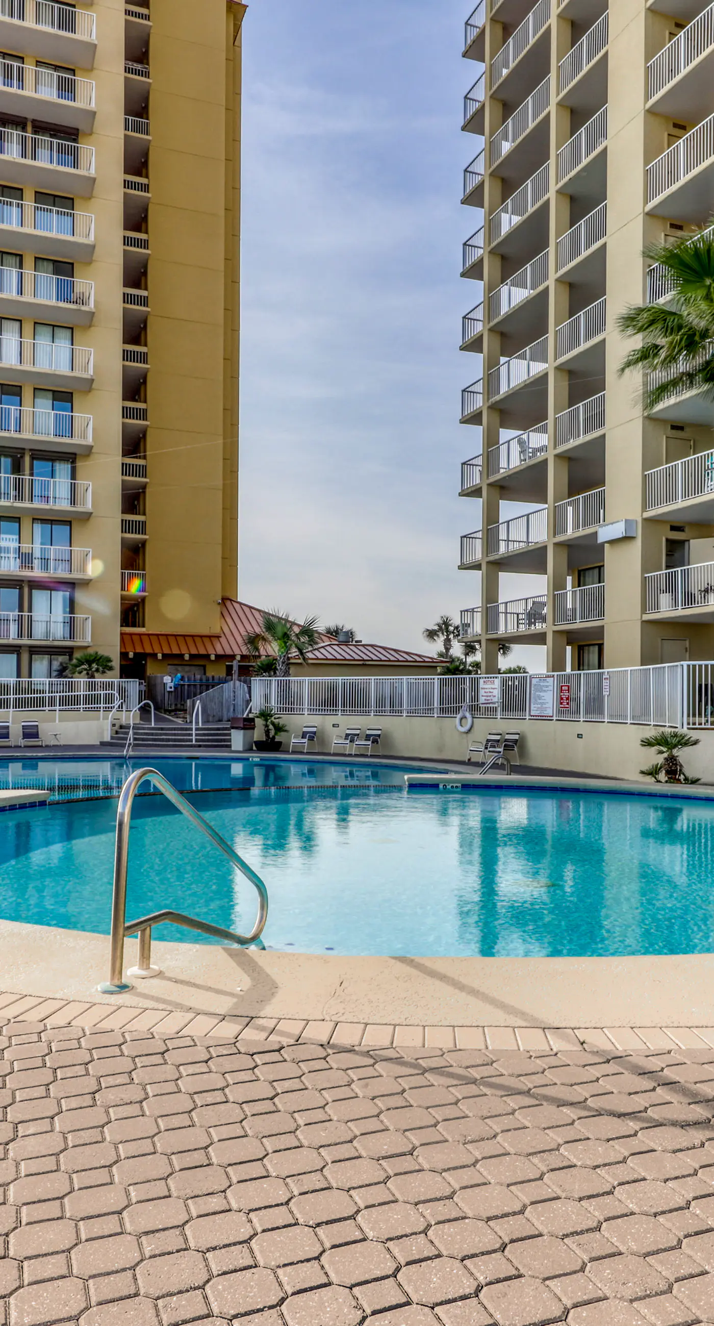 High-rise, Gulf-front condo with a balcony, pools, gym & tennis