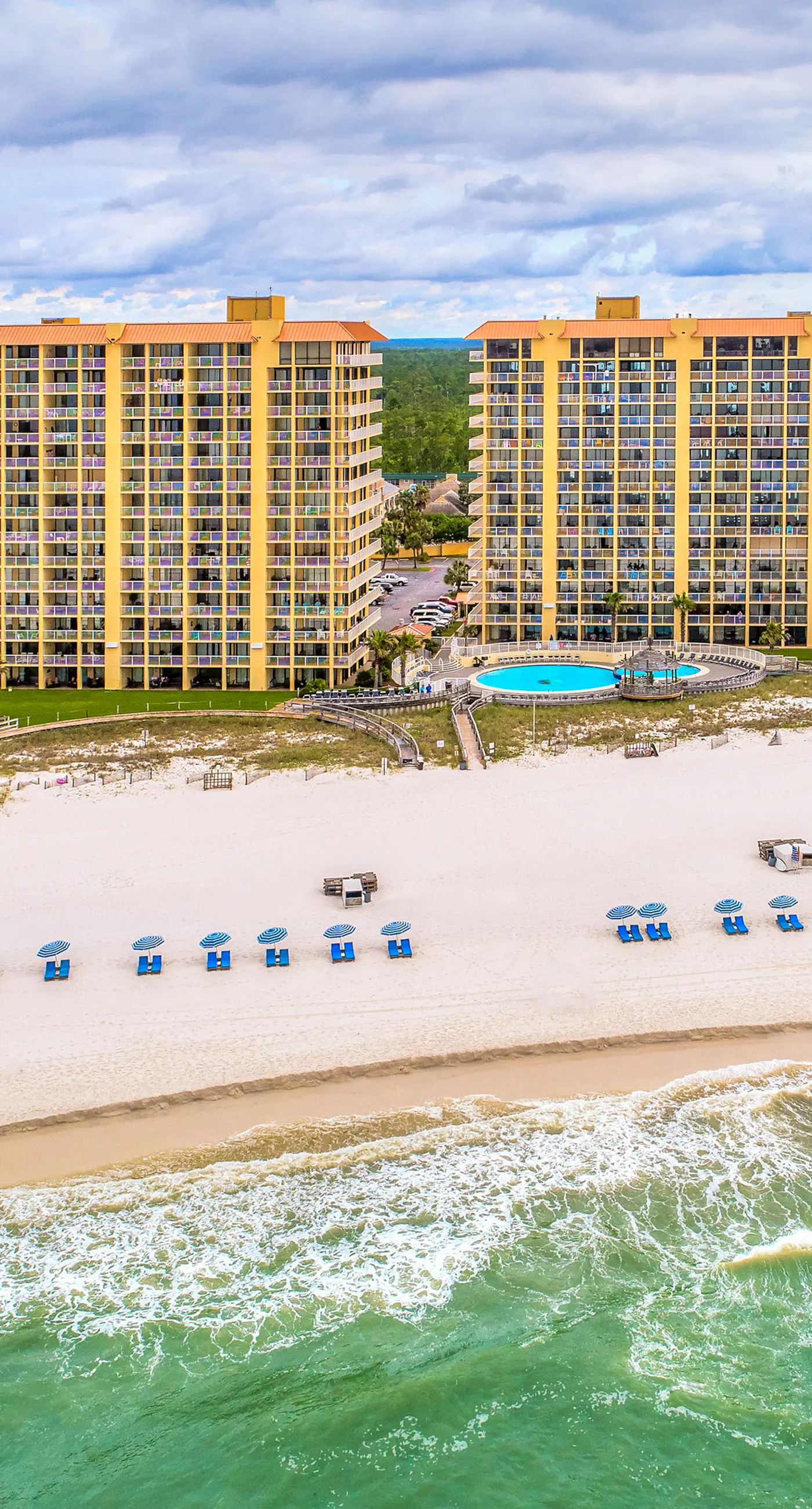 High-rise, Gulf-front condo with a balcony, pools, gym & tennis