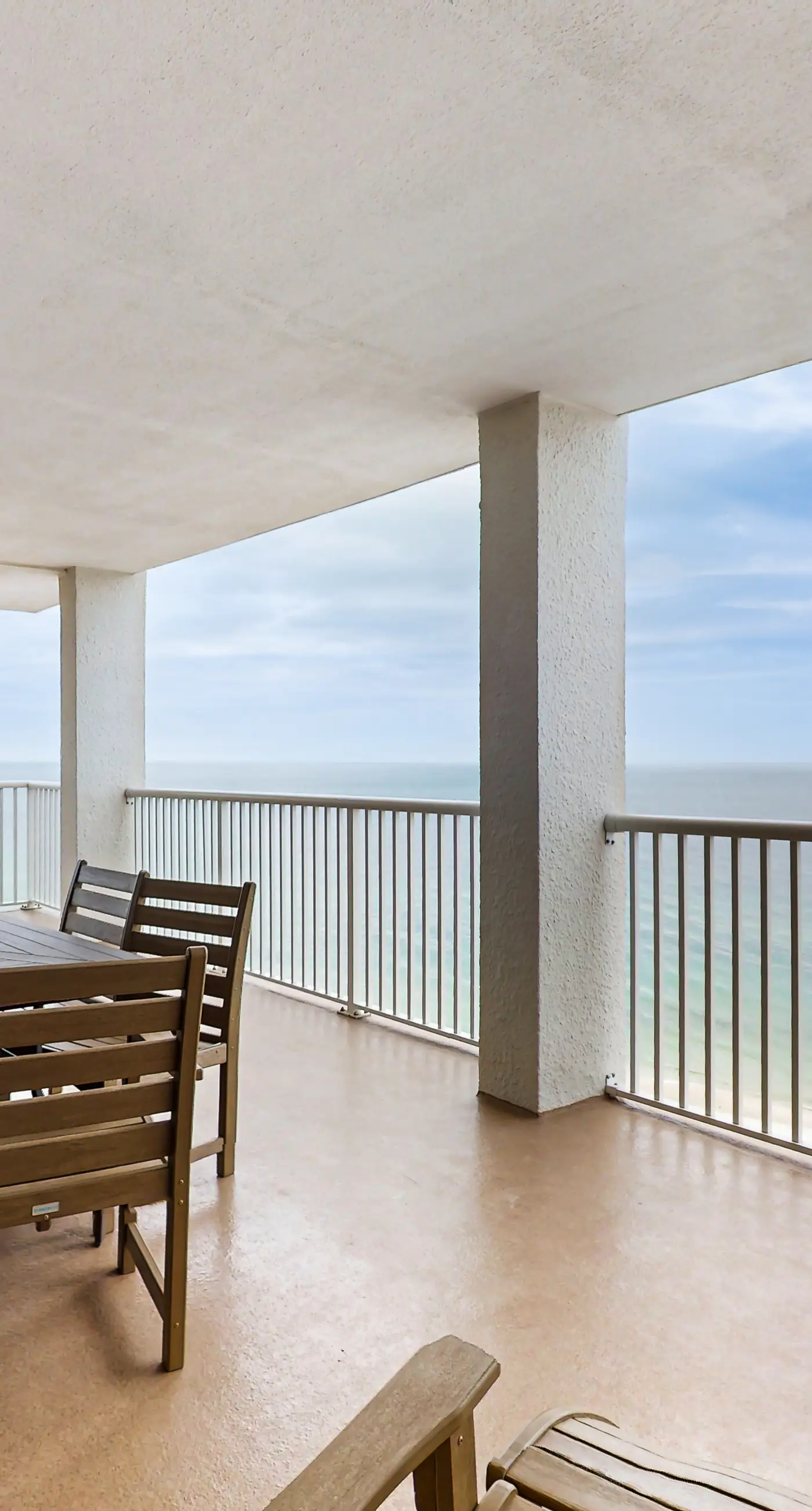 Gulf-front condo with balcony, hot tub & pools - snowbird-friendly