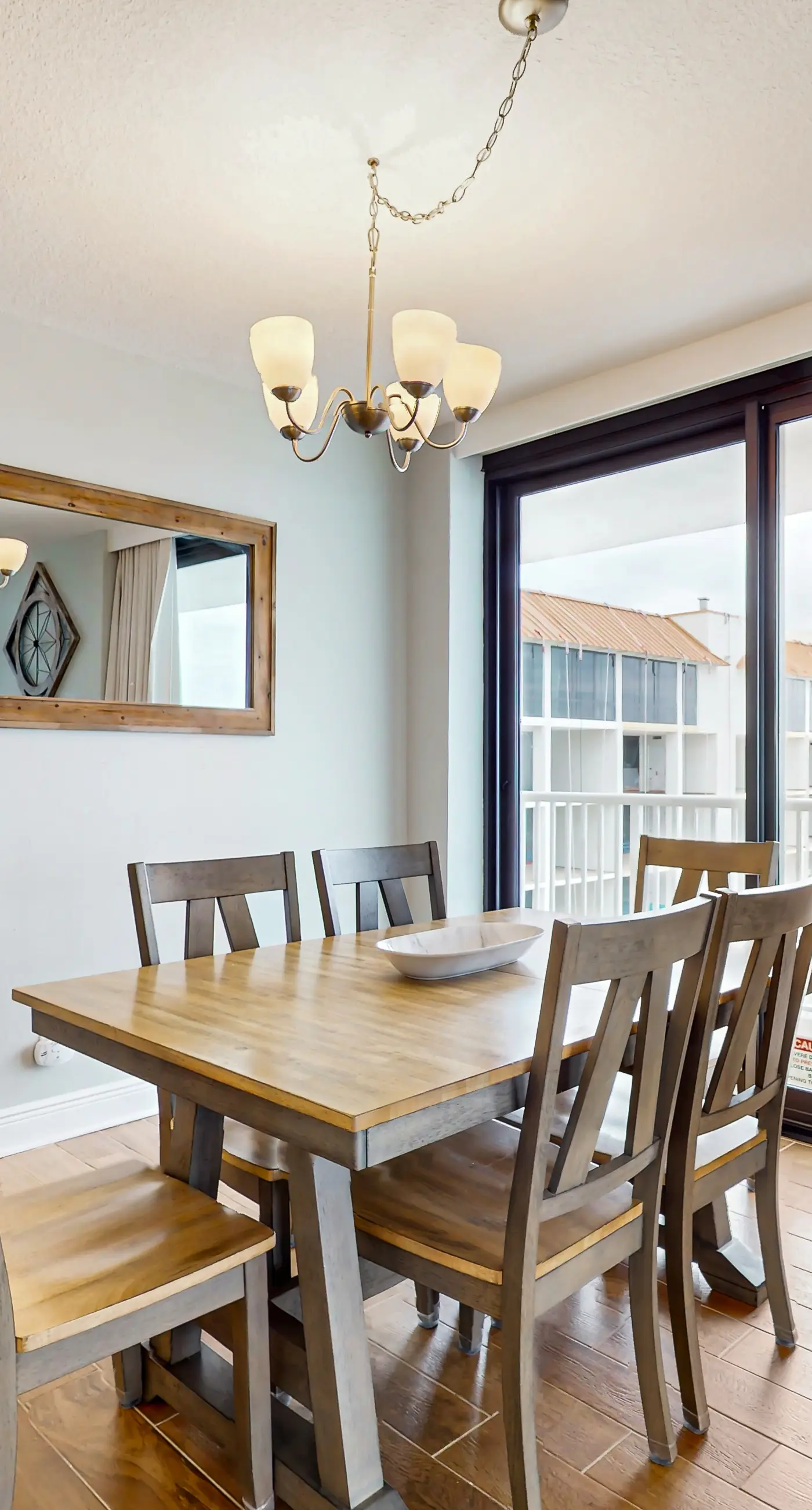 Gulf-front condo with balcony, hot tub & pools - snowbird-friendly