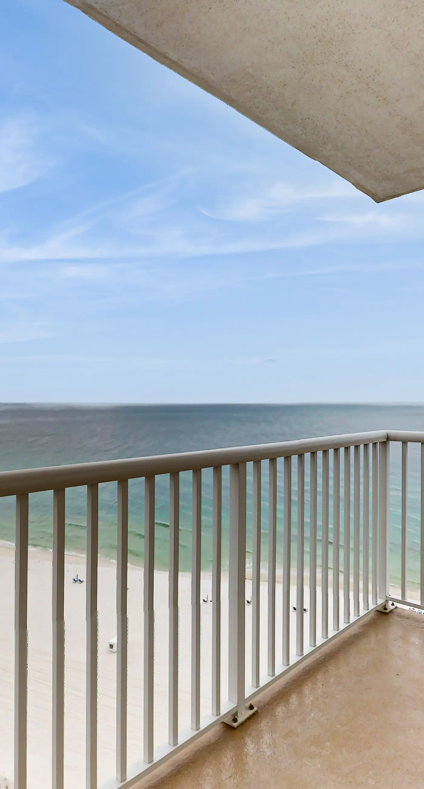 Gulf-front condo with balcony, hot tub & pools - snowbird-friendly