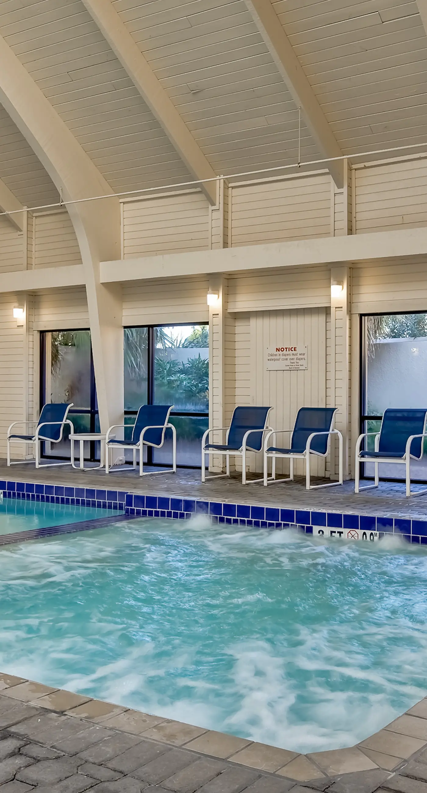 Gulf-front condo with balcony, hot tub & pools - snowbird-friendly