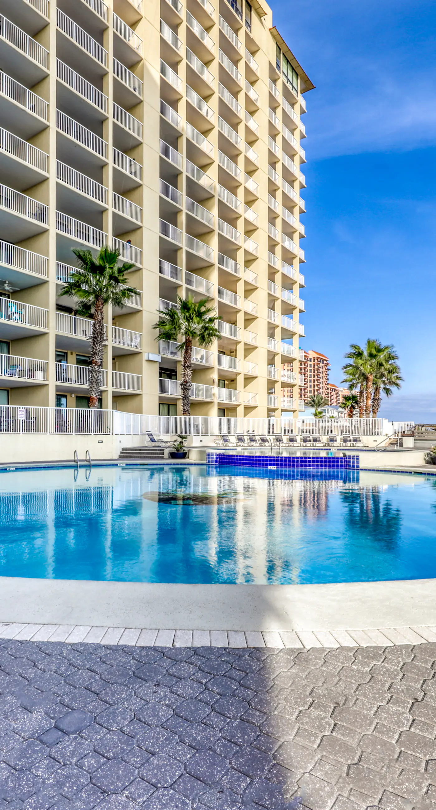 Gulf-front condo with easy beach access, gym, hot tub & pools
