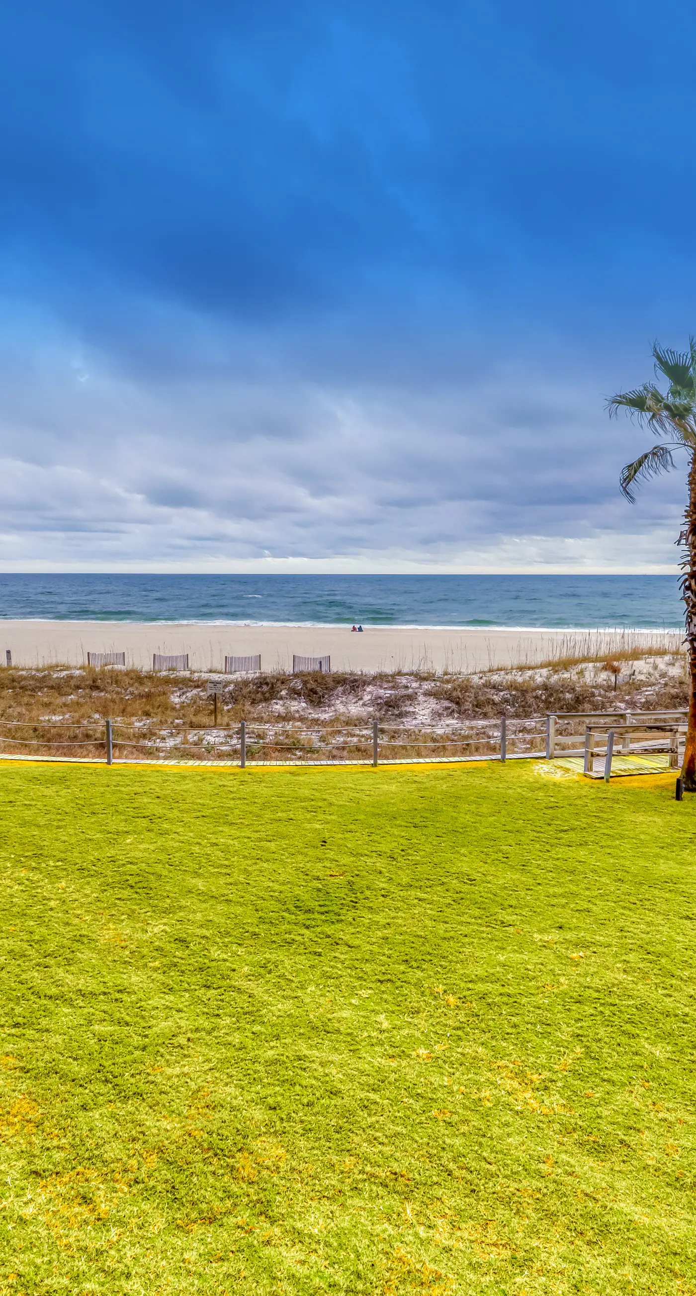 Gulf-front condo with easy beach access, gym, hot tub & pools