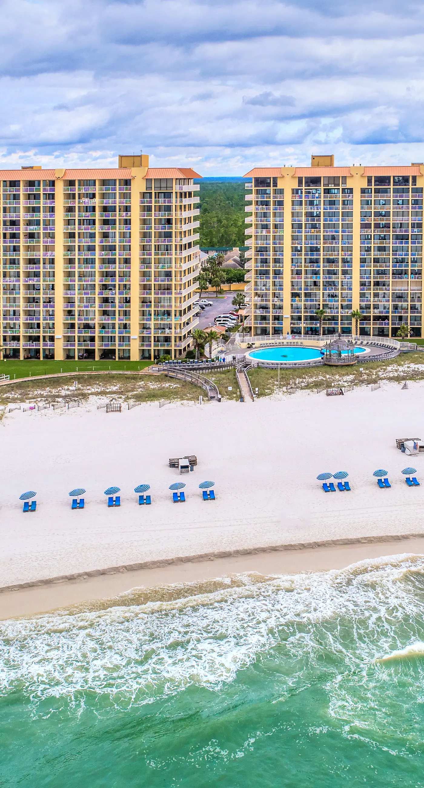 Gulf-front condo with easy beach access, gym, hot tub & pools