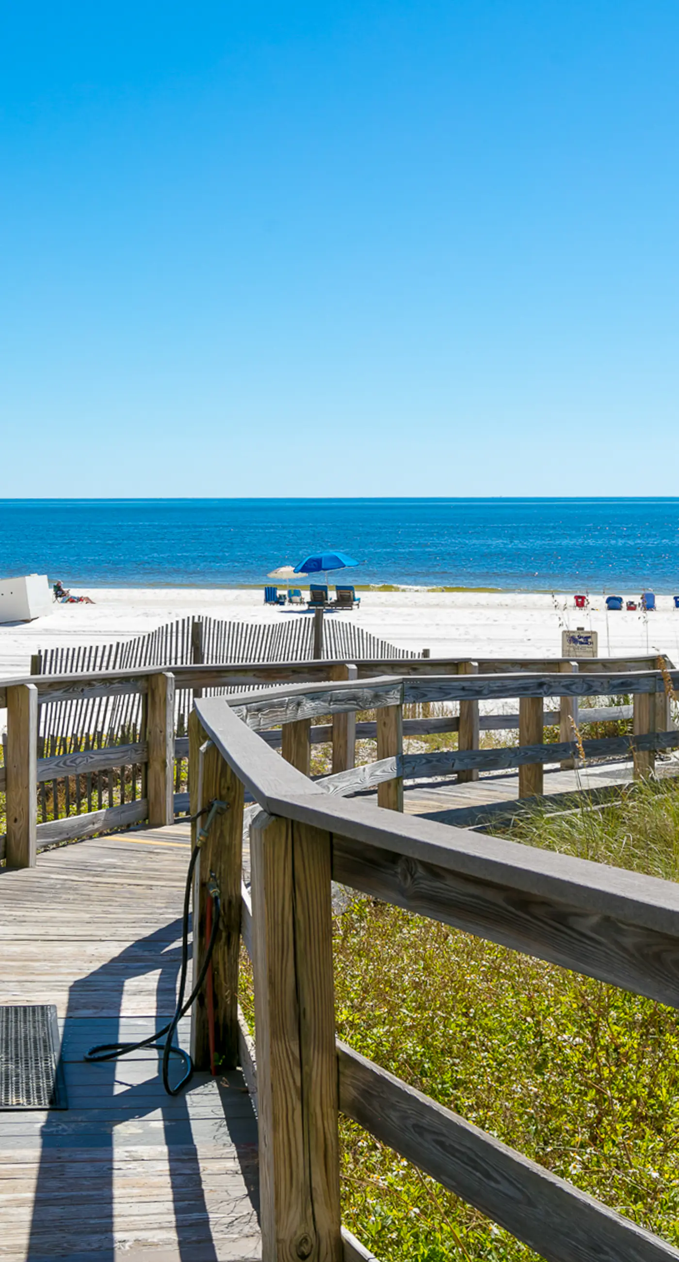 Gulf-front condo with easy beach access, gym, hot tub & pools