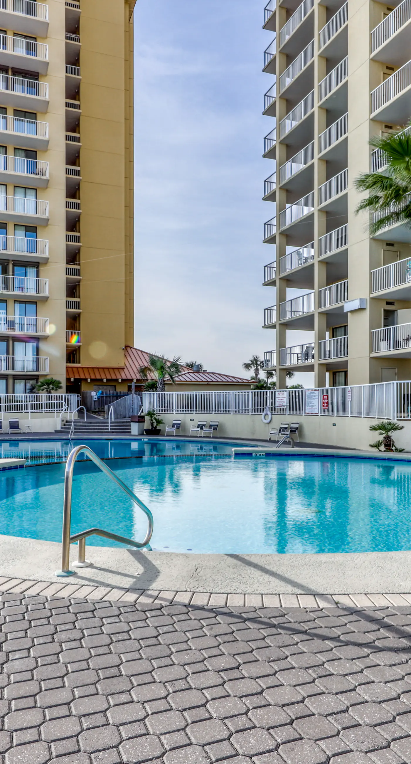 Gulf-front condo with easy beach access, gym, hot tub & pools
