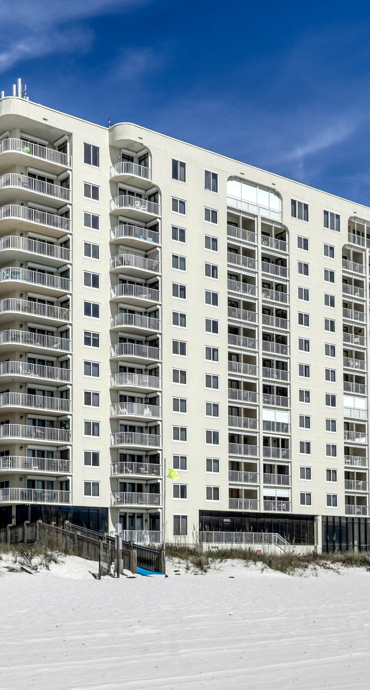 Waterfront condo w/ a private balcony, community pools, & fitness center