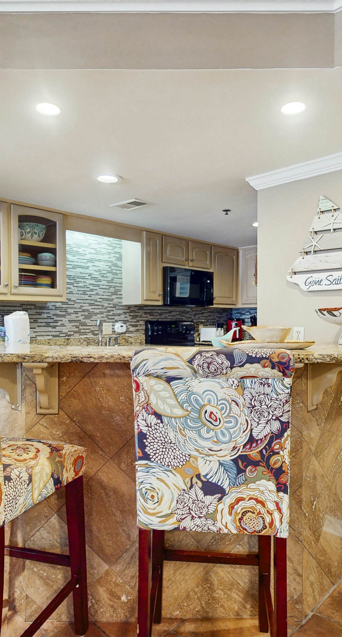 Waterfront condo w/ a private balcony, community pools, & fitness center