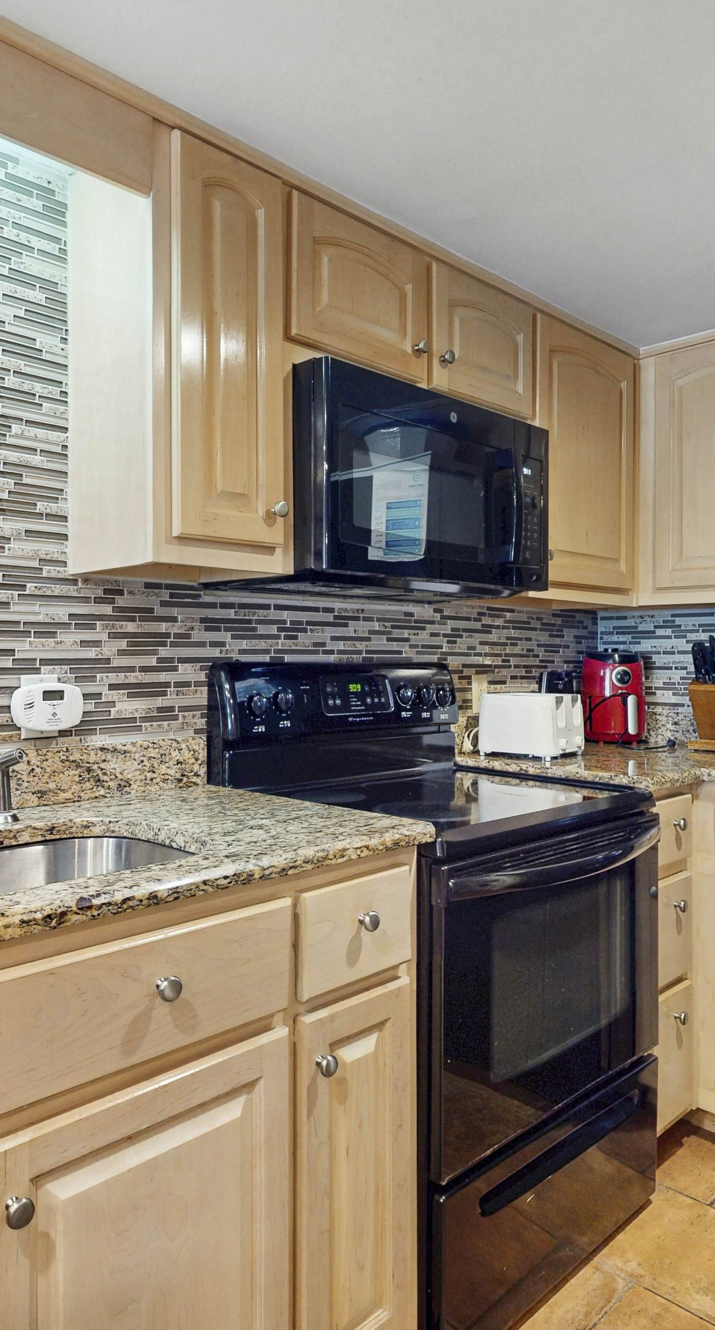 Waterfront condo w/ a private balcony, community pools, & fitness center