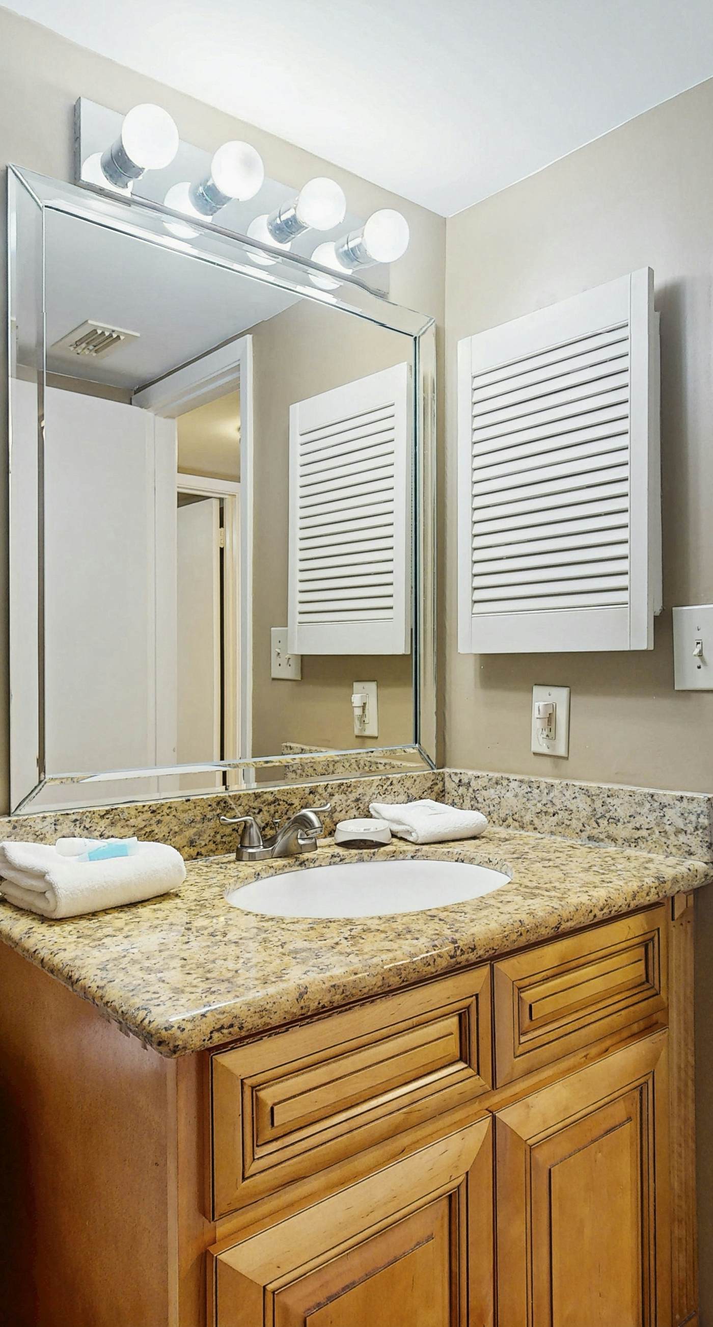 Waterfront condo w/ a private balcony, community pools, & fitness center