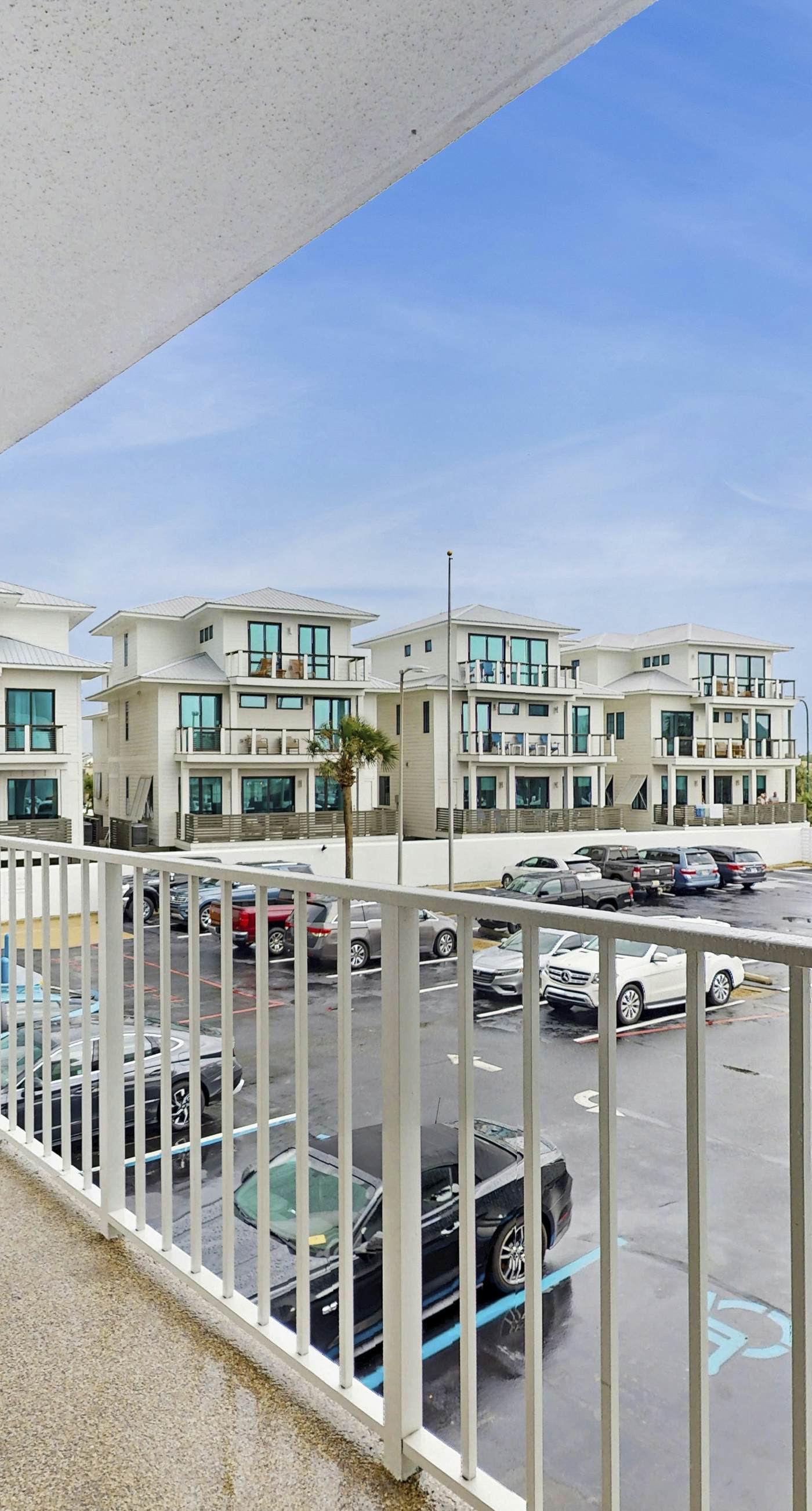 Waterfront condo w/ a private balcony, community pools, & fitness center