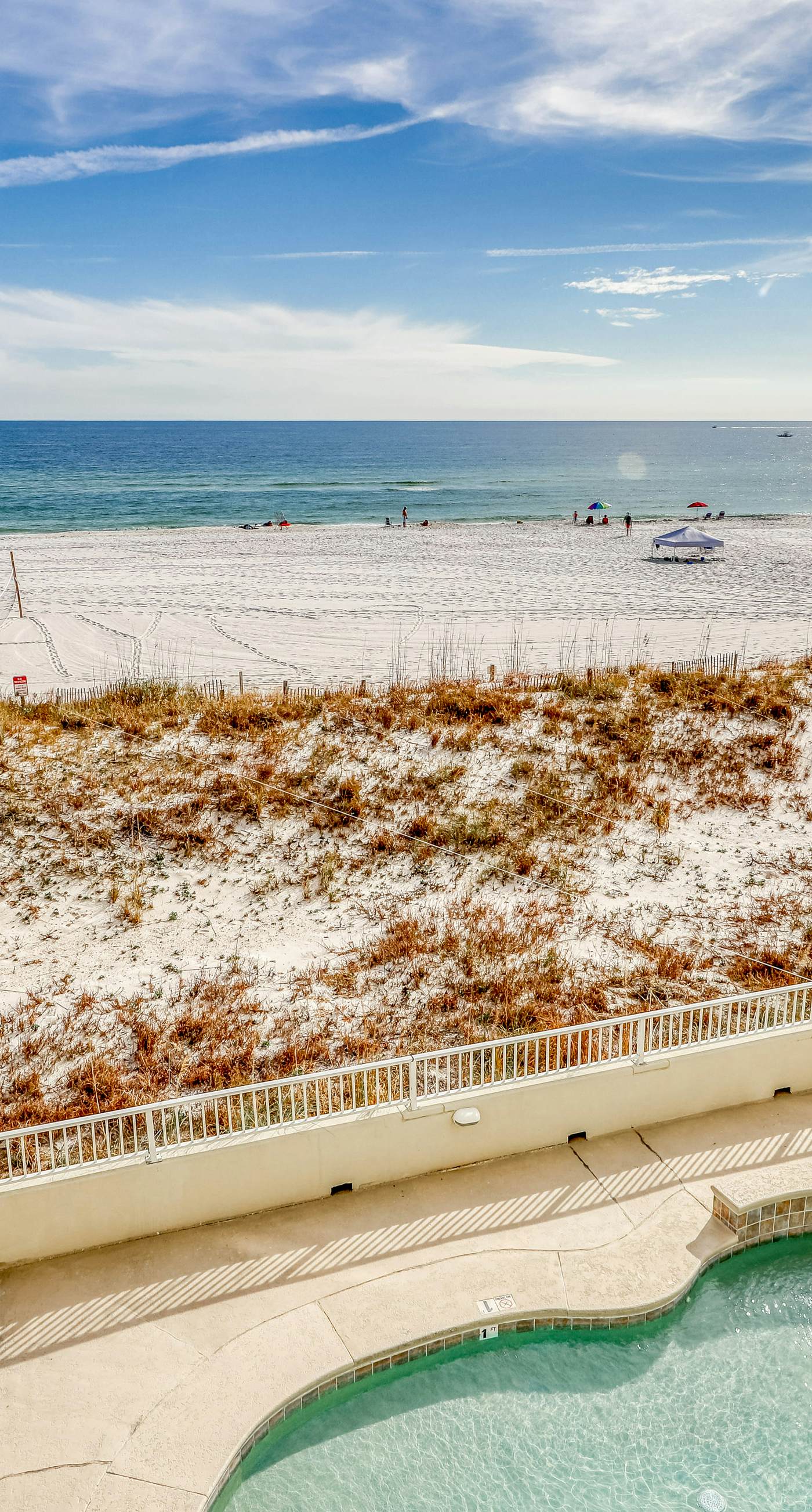 Waterfront condo w/ a private balcony, community pools, & fitness center