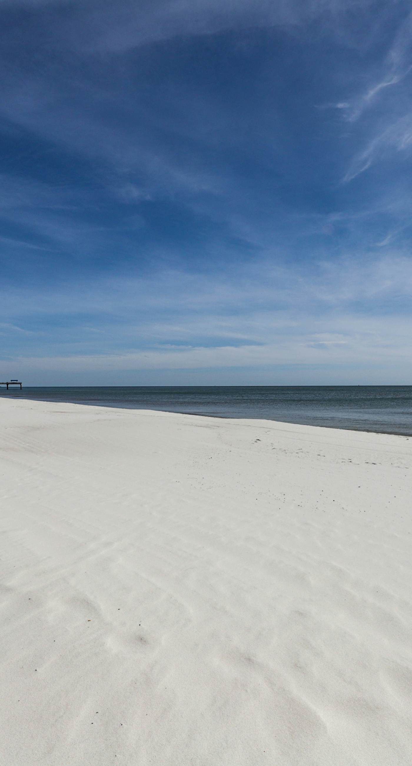 Waterfront condo w/ a private balcony, community pools, & fitness center