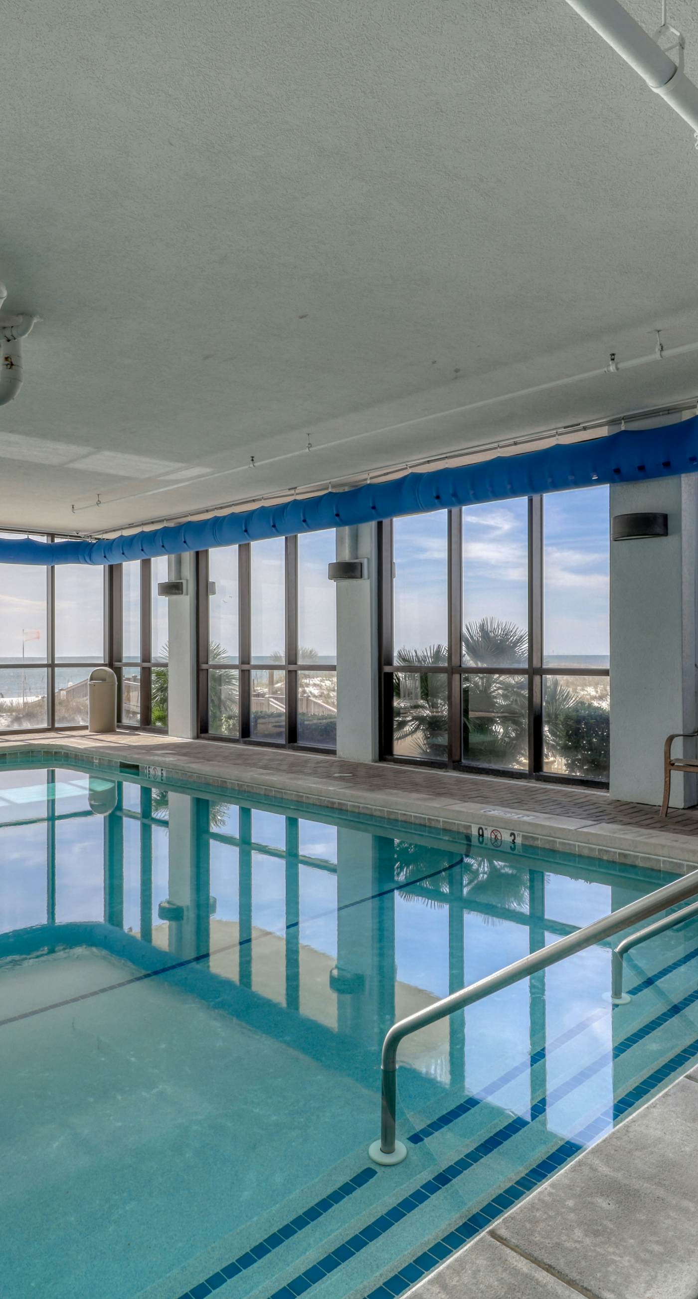 Waterfront condo w/ a private balcony, community pools, & fitness center