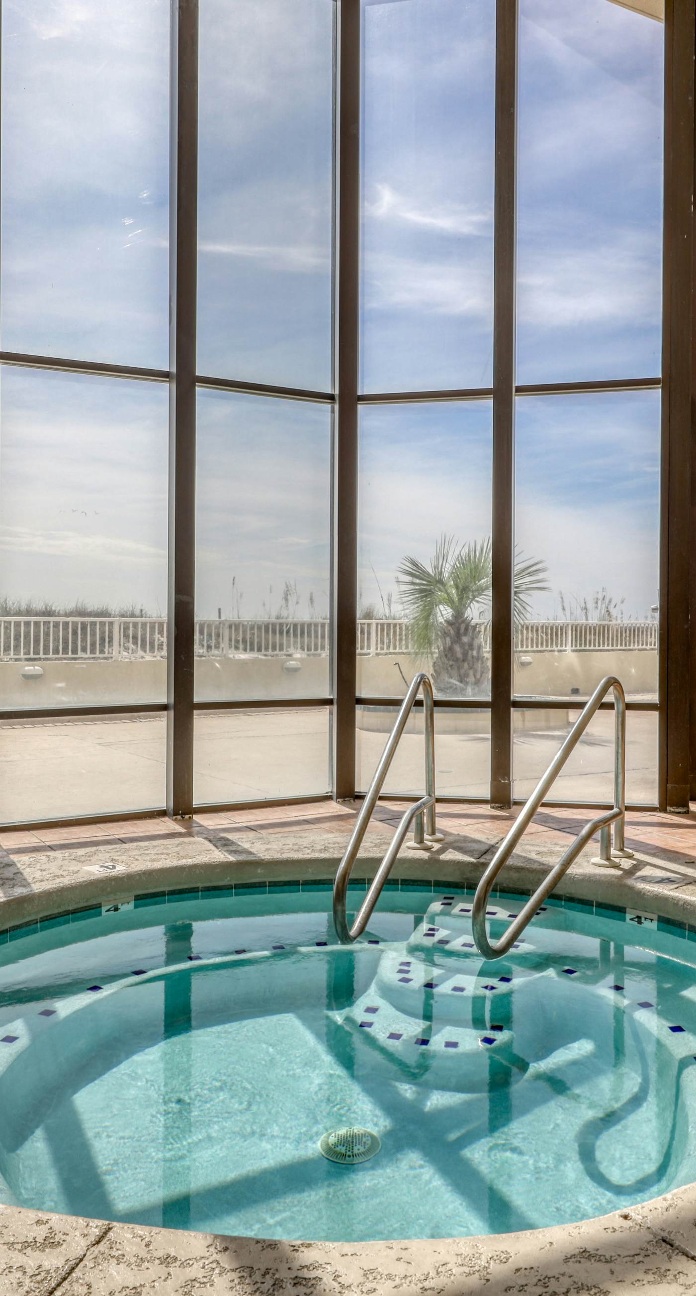Waterfront condo w/ a private balcony, community pools, & fitness center