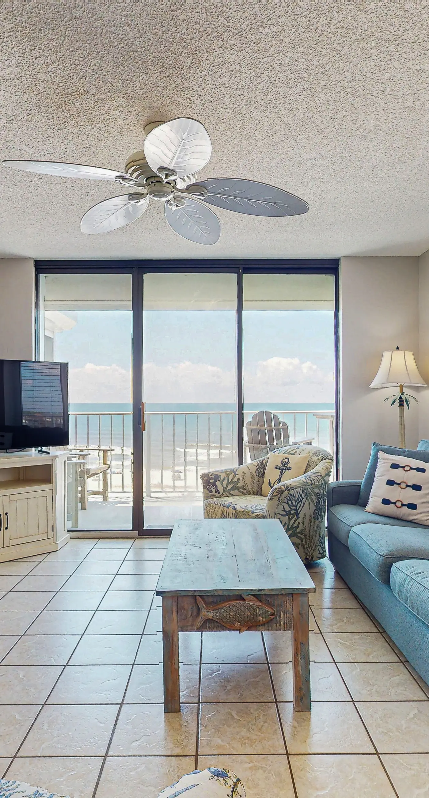 Beachfront condo w/ private, corner balcony, community pools, & a grilling area