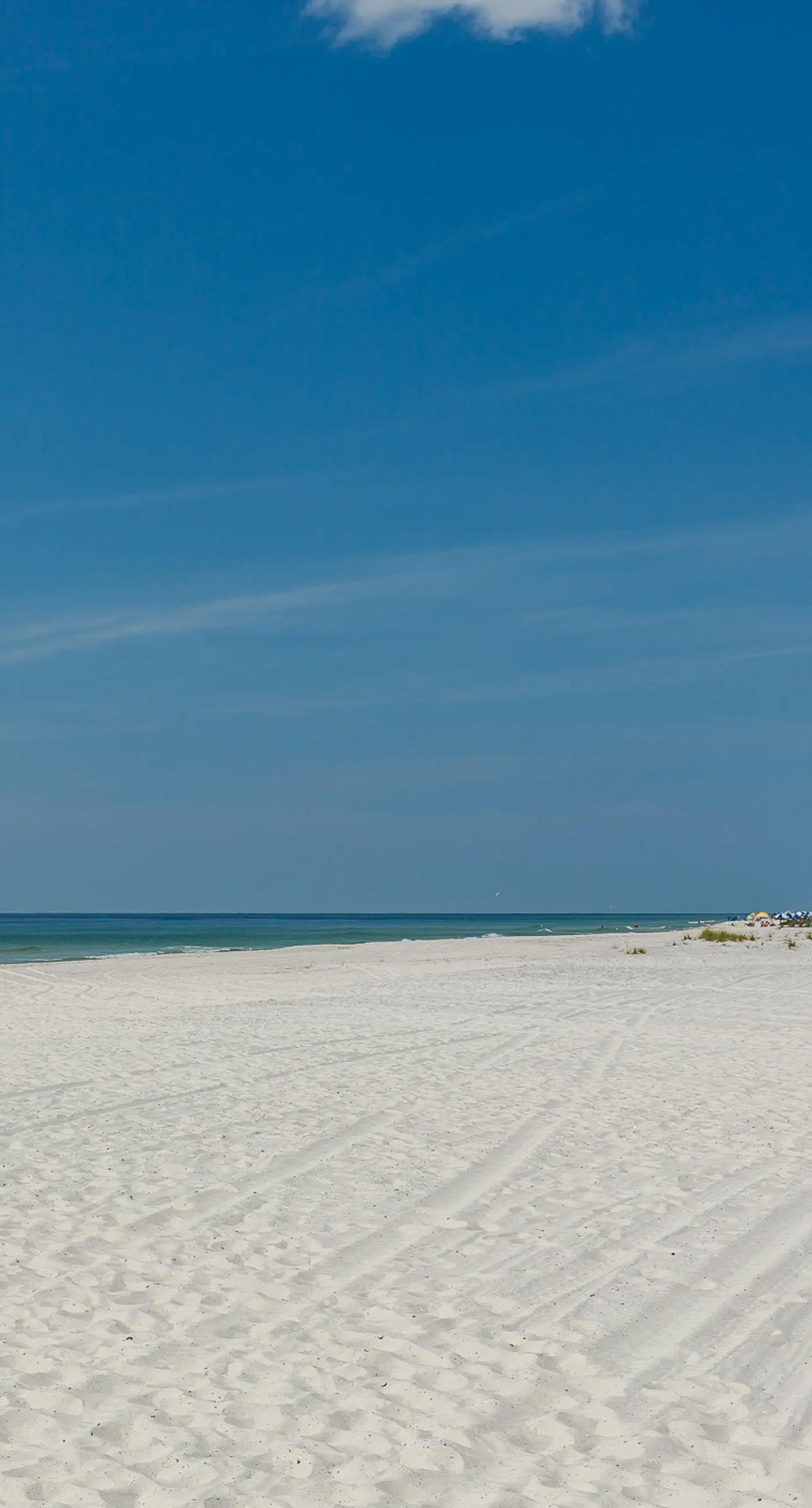 Beachfront condo w/ private, corner balcony, community pools, & a grilling area