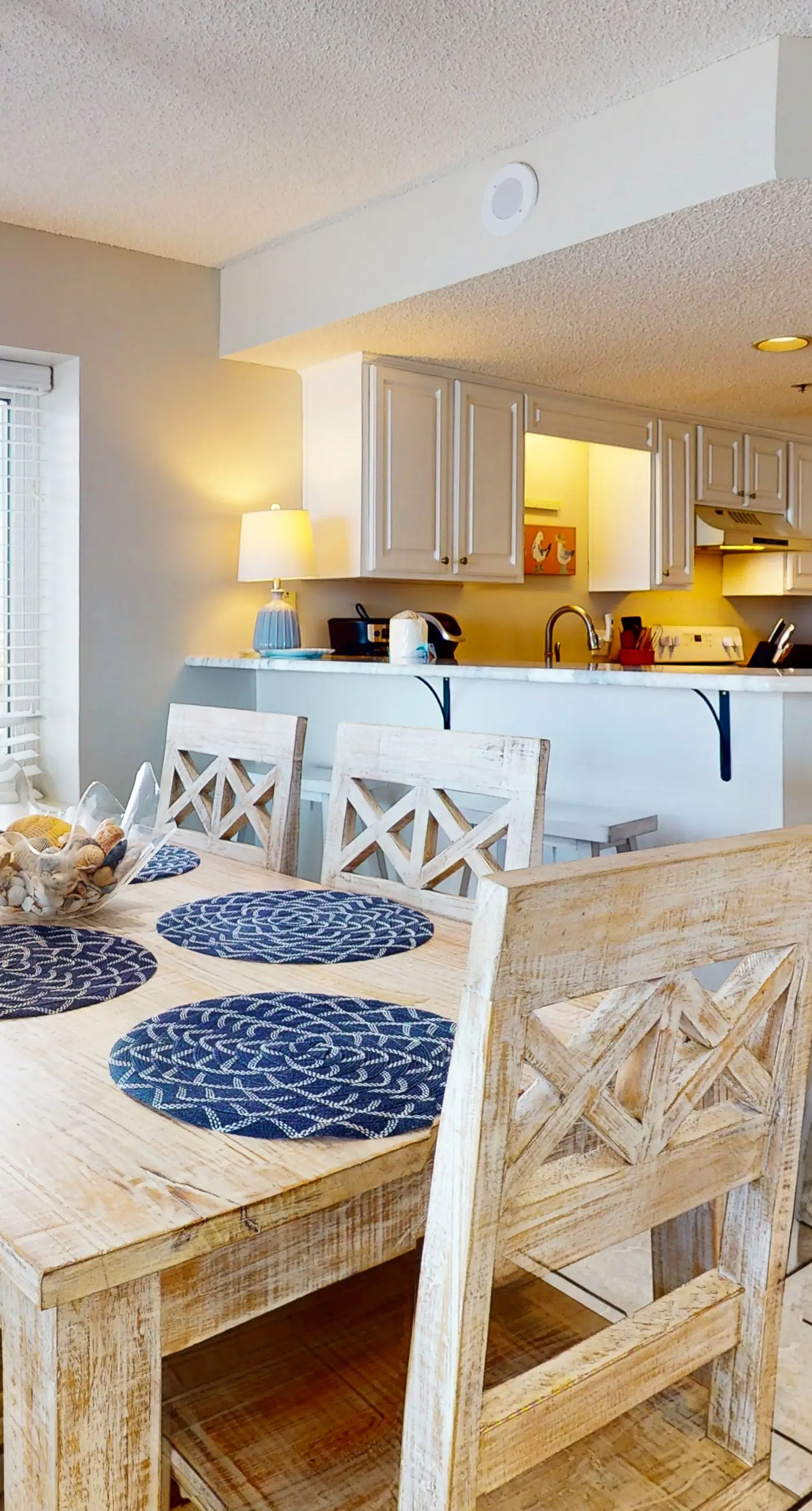 Beachfront condo w/ private, corner balcony, community pools, & a grilling area