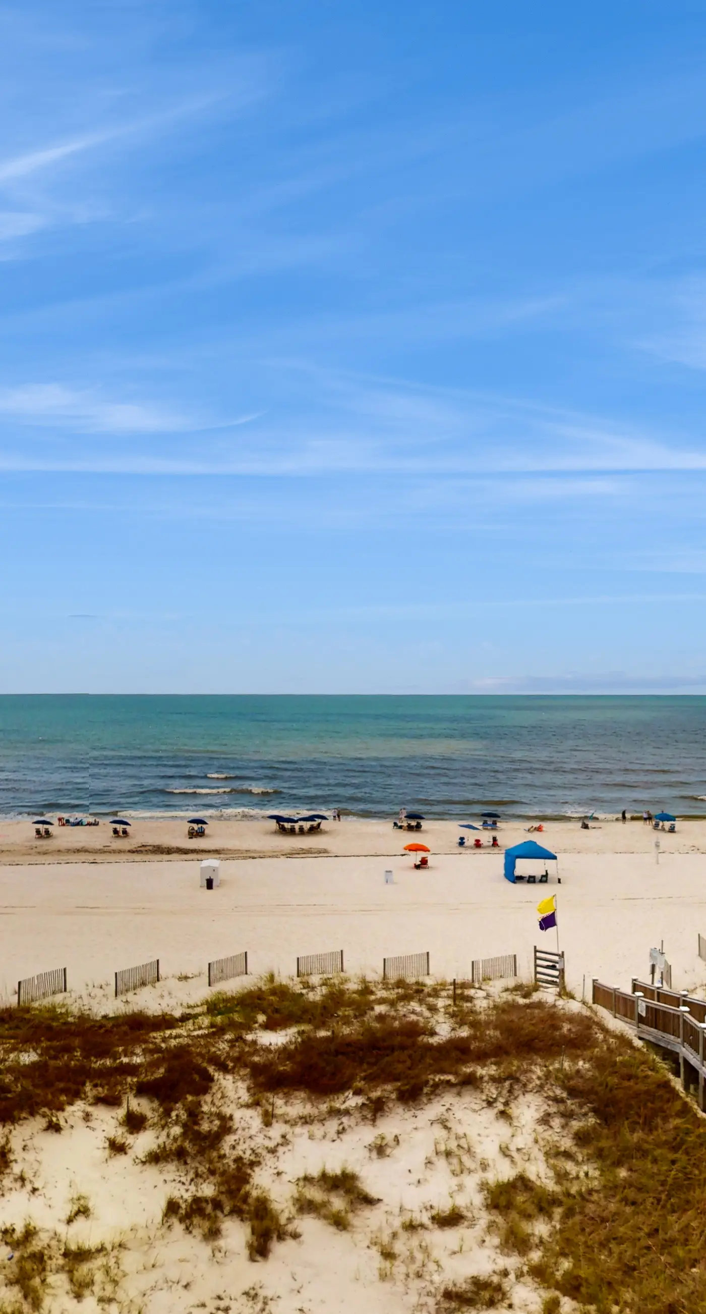 Beachfront condo w/ private, corner balcony, community pools, & a grilling area