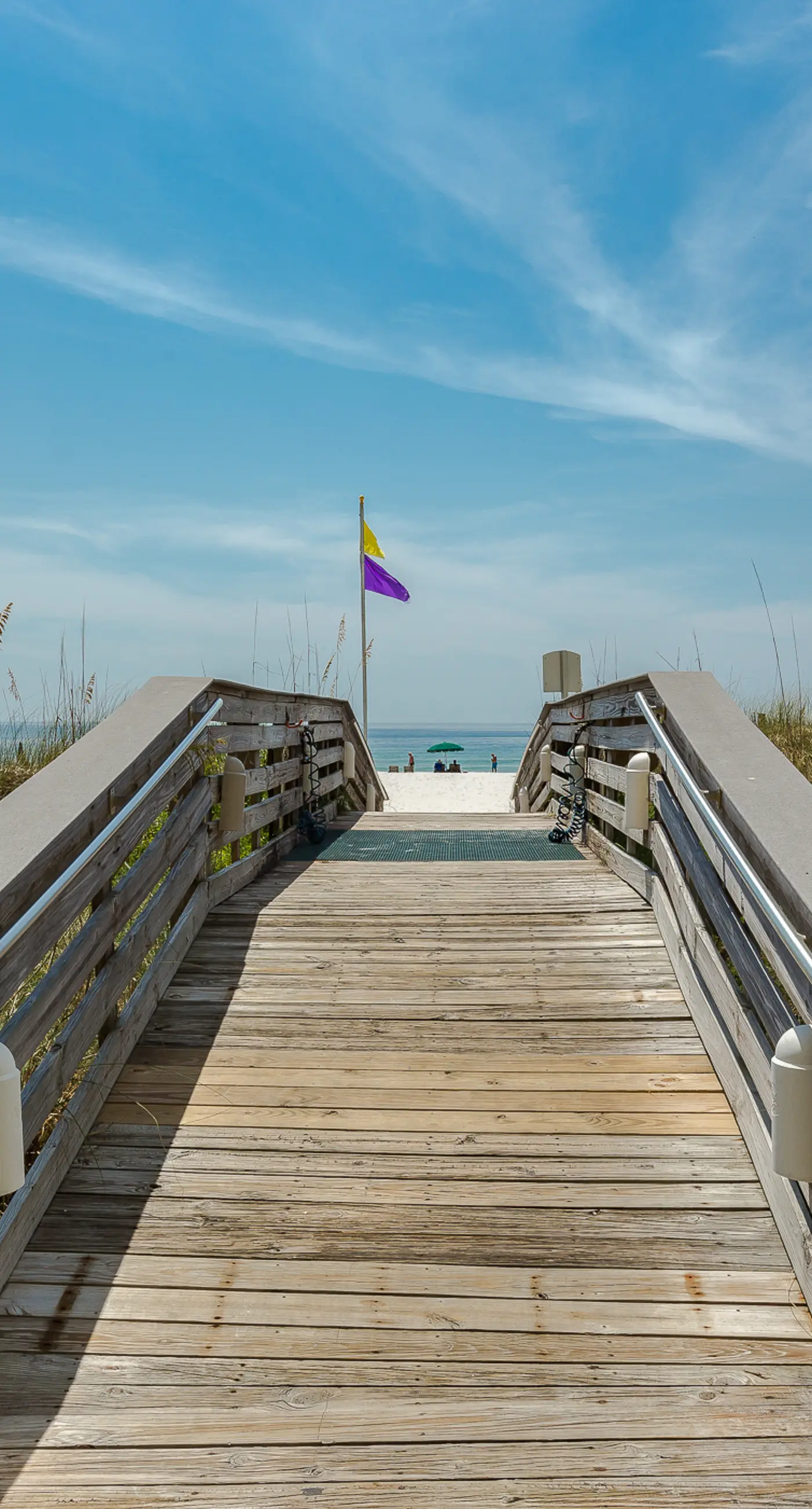 Beachfront condo w/ private, corner balcony, community pools, & a grilling area