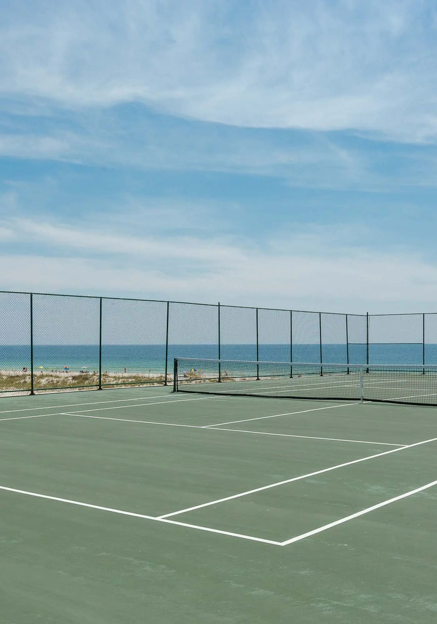 Beachfront condo w/ private, corner balcony, community pools, & a grilling area