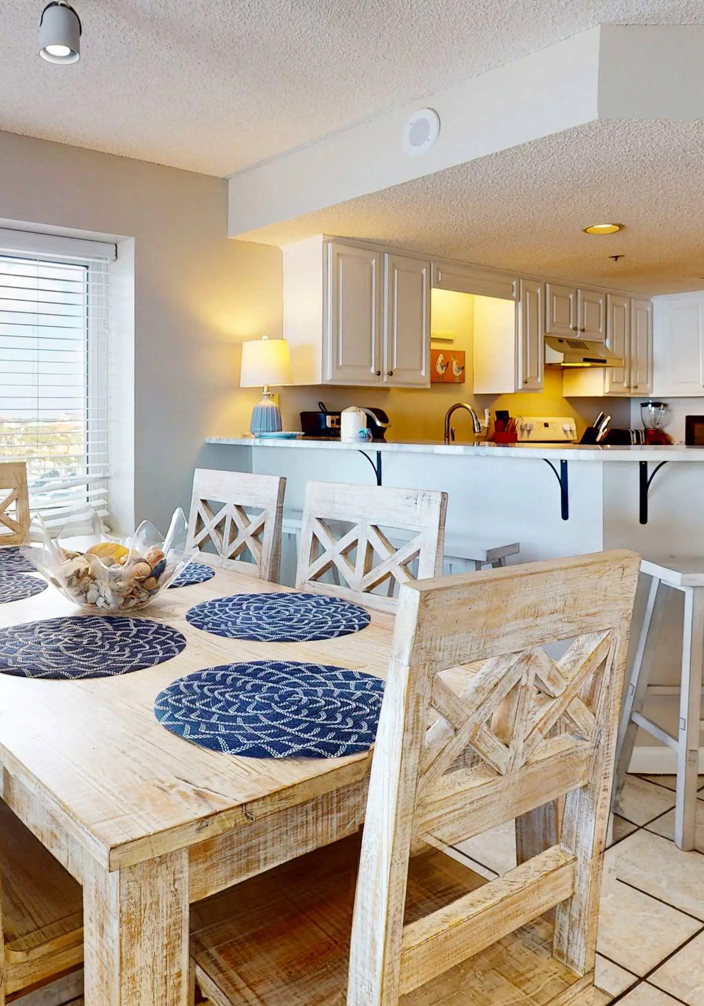 Beachfront condo w/ private, corner balcony, community pools, & a grilling area