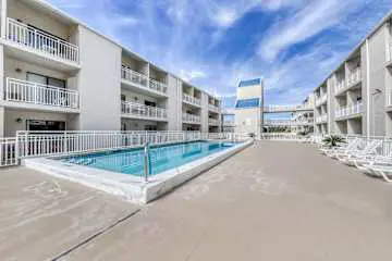 Family-friendly condo w/ a spacious living area, shared pools, & tennis courts