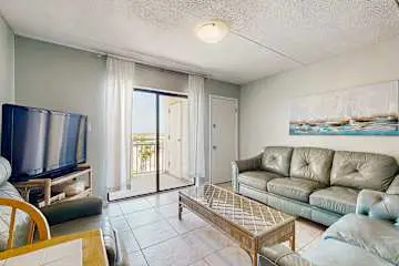 Family-friendly condo w/ a spacious living area, shared pools, & tennis courts