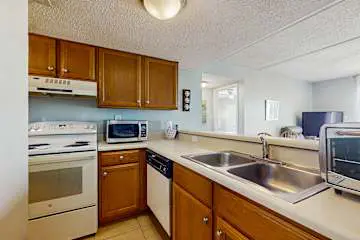 Family-friendly condo w/ a spacious living area, shared pools, & tennis courts
