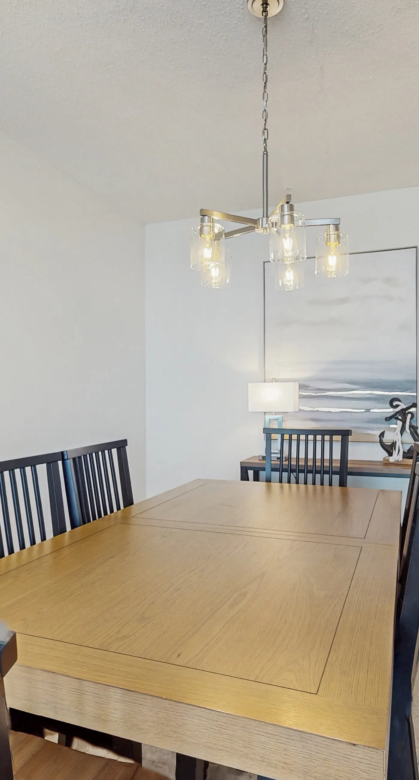 Gorgeous beachfront condo with open layout, pools, tennis, & gym