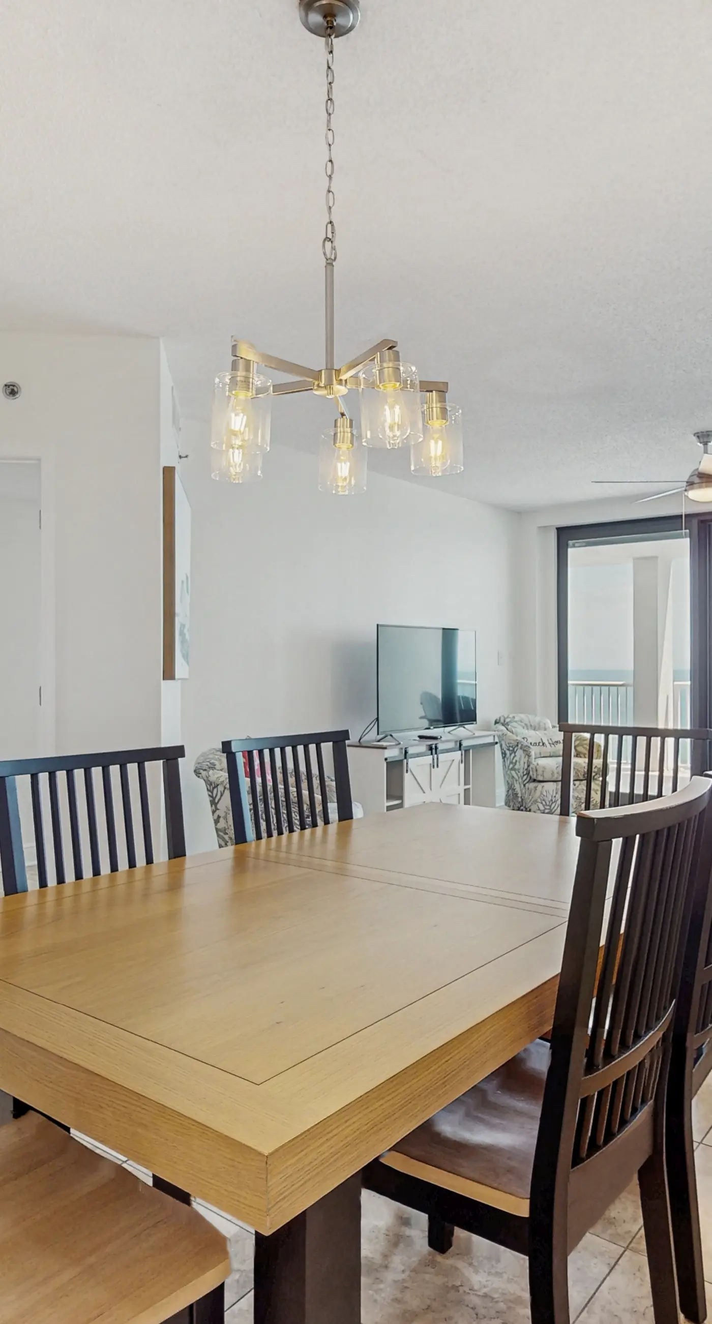 Gorgeous beachfront condo with open layout, pools, tennis, & gym