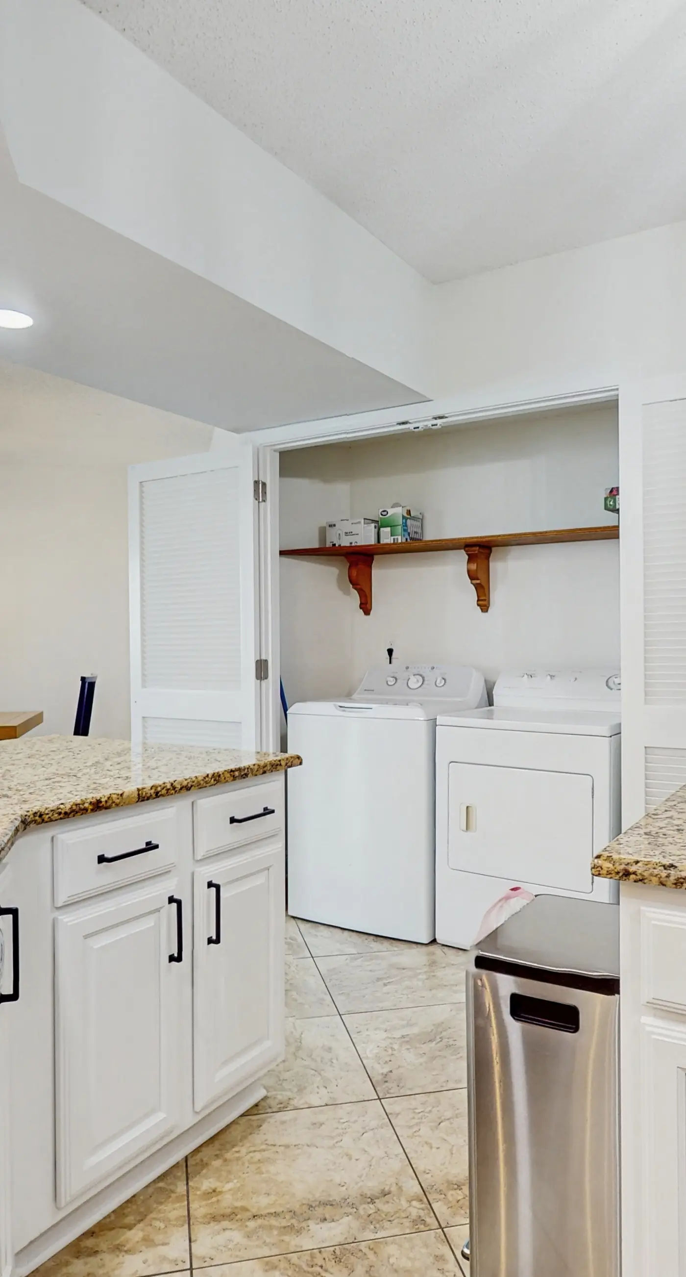 Gorgeous beachfront condo with open layout, pools, tennis, & gym