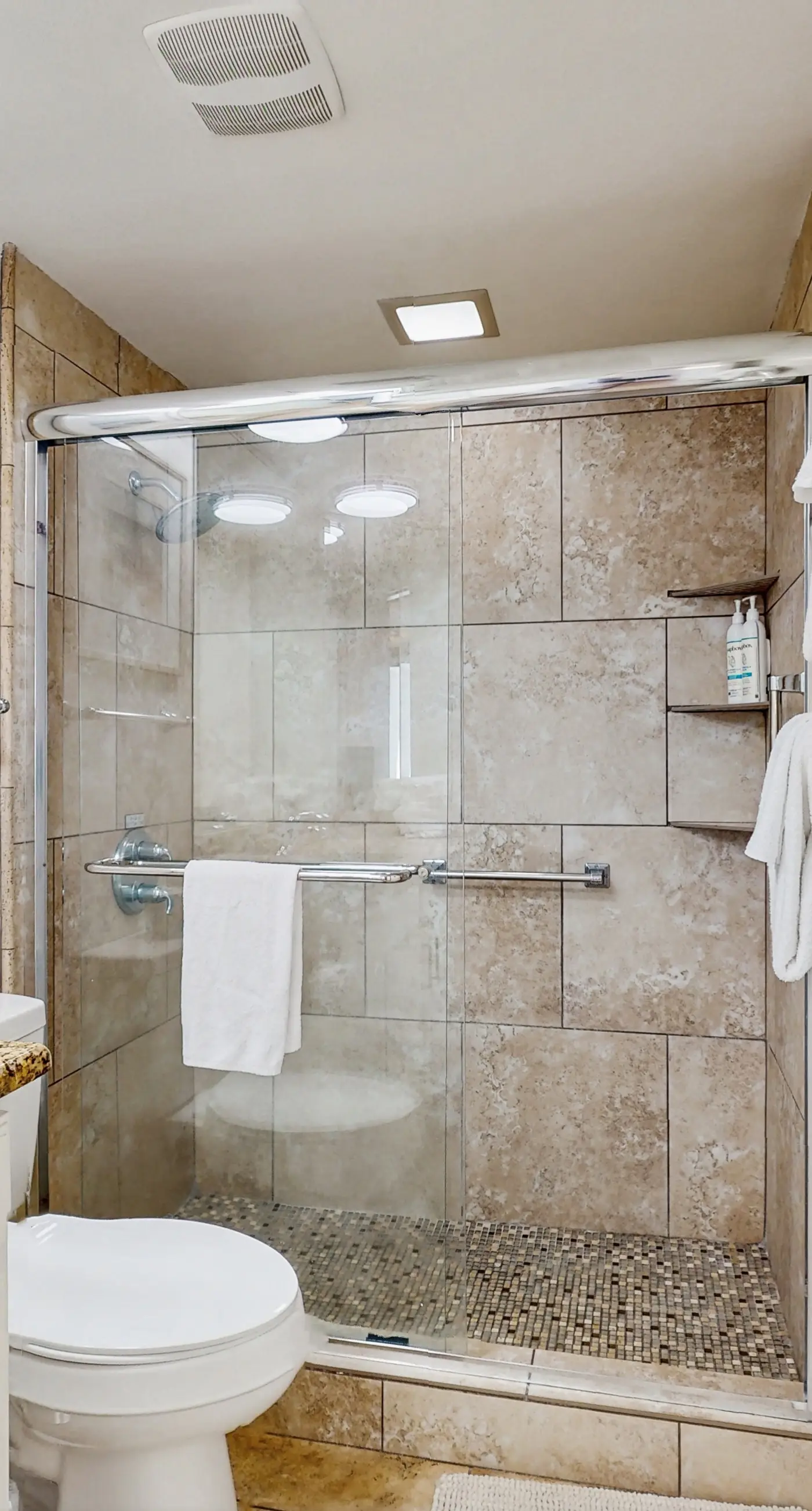 Gorgeous beachfront condo with open layout, pools, tennis, & gym